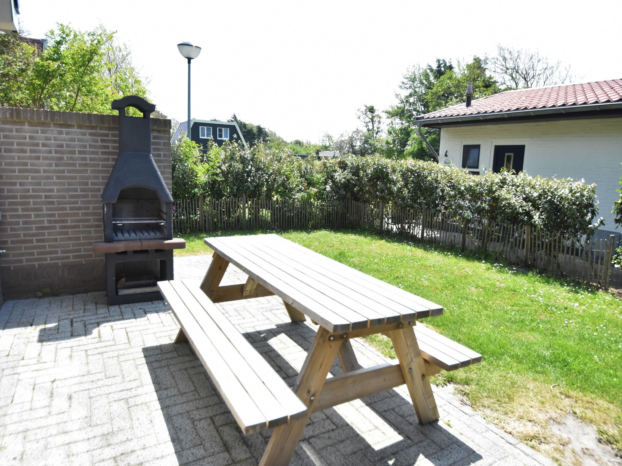 De tuin van 8p Garnekuul 1 in Callantsoog