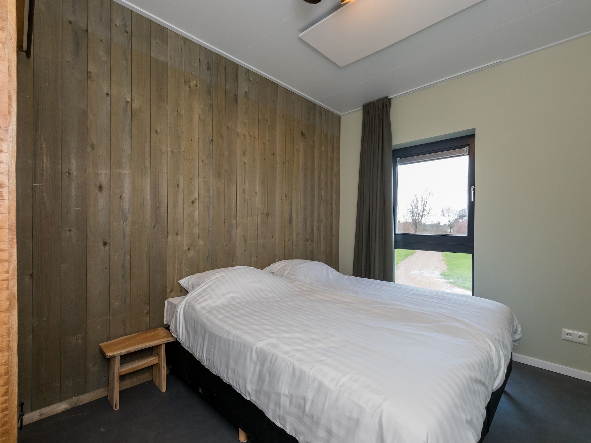 Een slaapkamer van Vroondijk 2-Zeebloesem in Vrouwenpolder