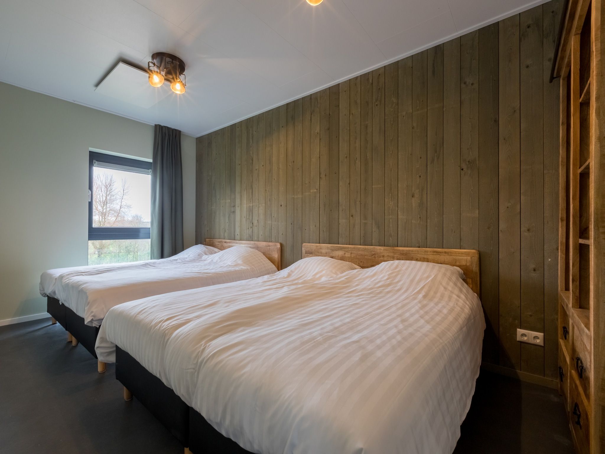 Een slaapkamer van Vroondijk 2-Zeebloesem in Vrouwenpolder