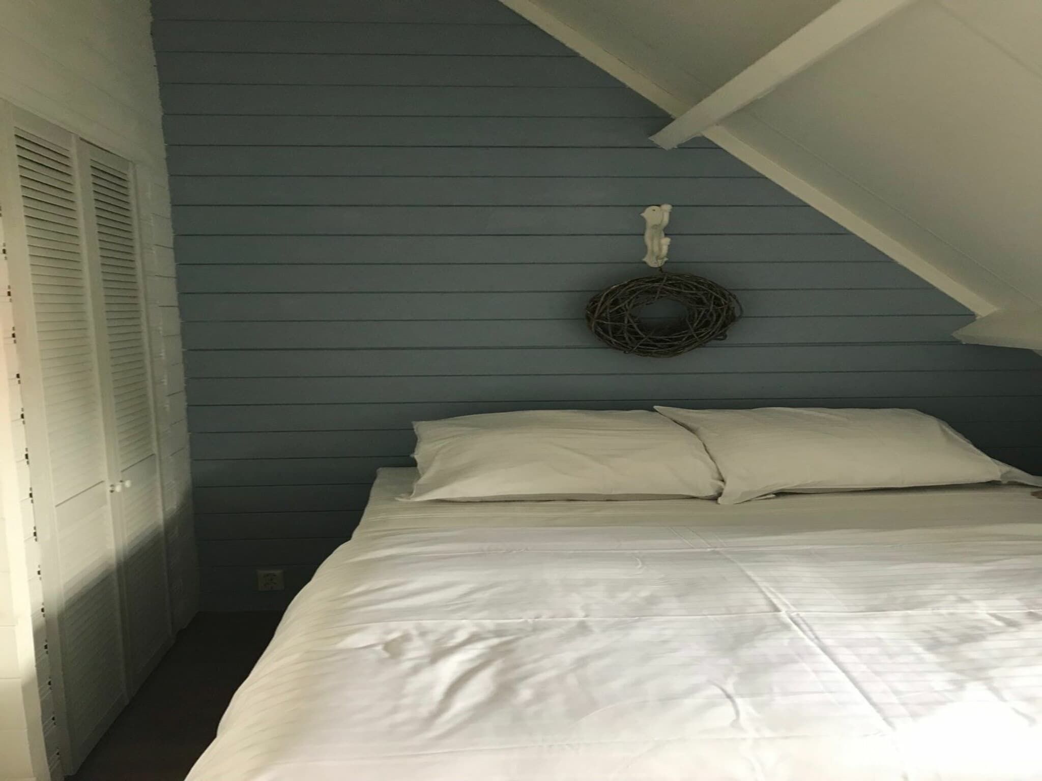 Een slaapkamer van Hoge Weide 64 in Oostkapelle