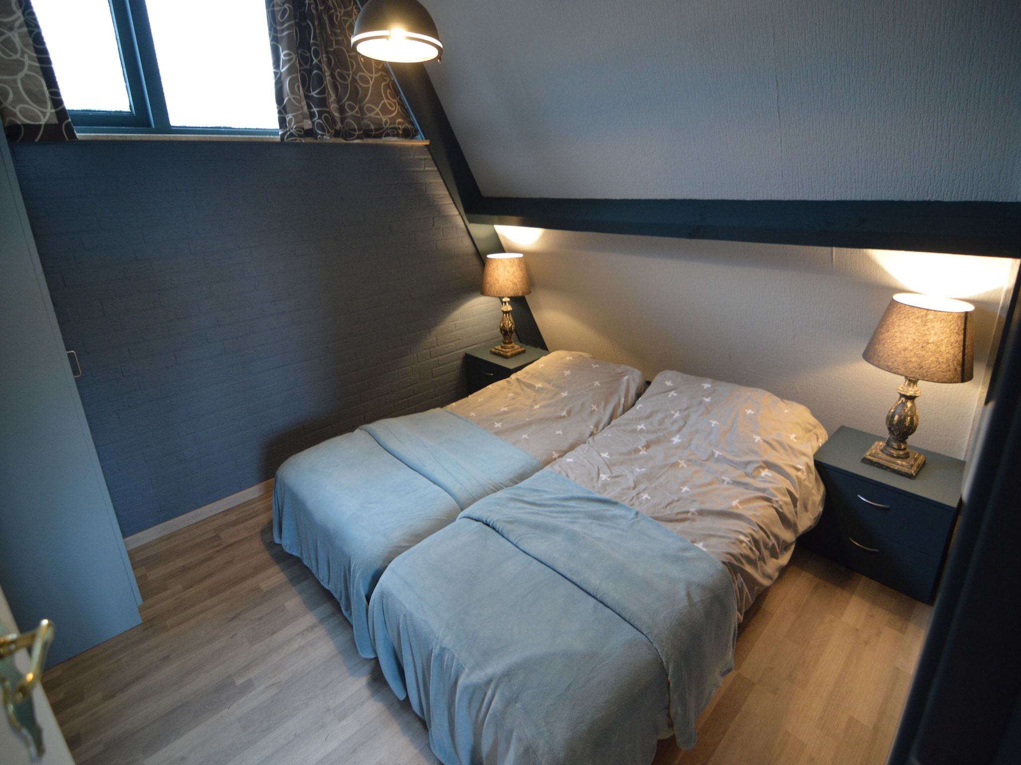 Een slaapkamer van Bungalow 64 en 65 in Stramproy