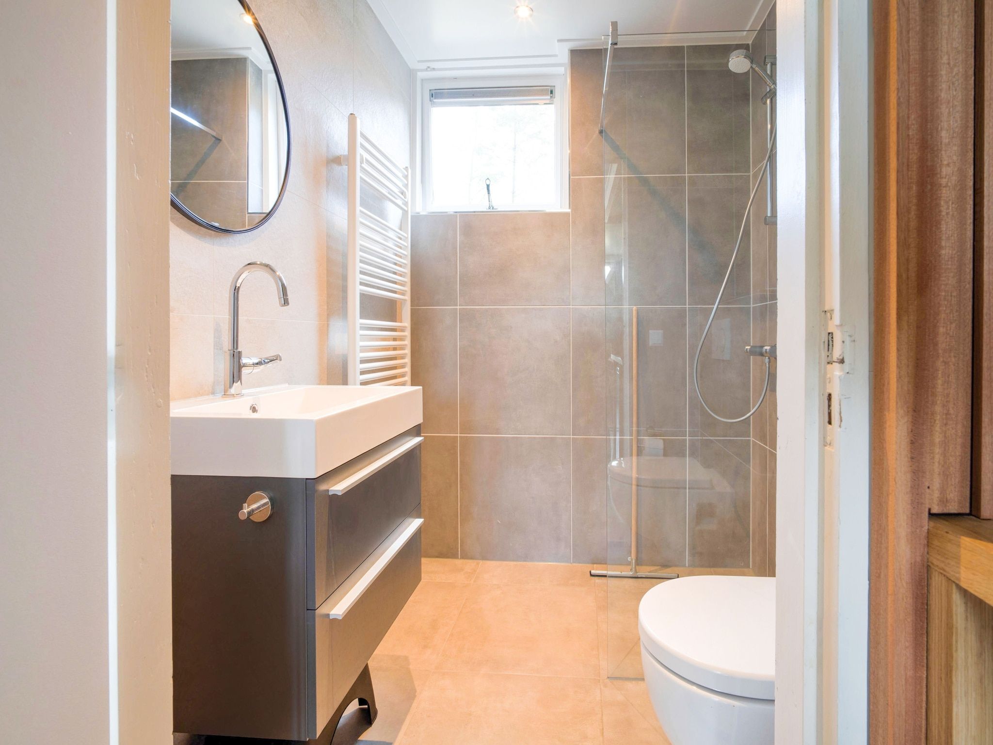 De badkamer van Bungalow 64 en 65 in Stramproy