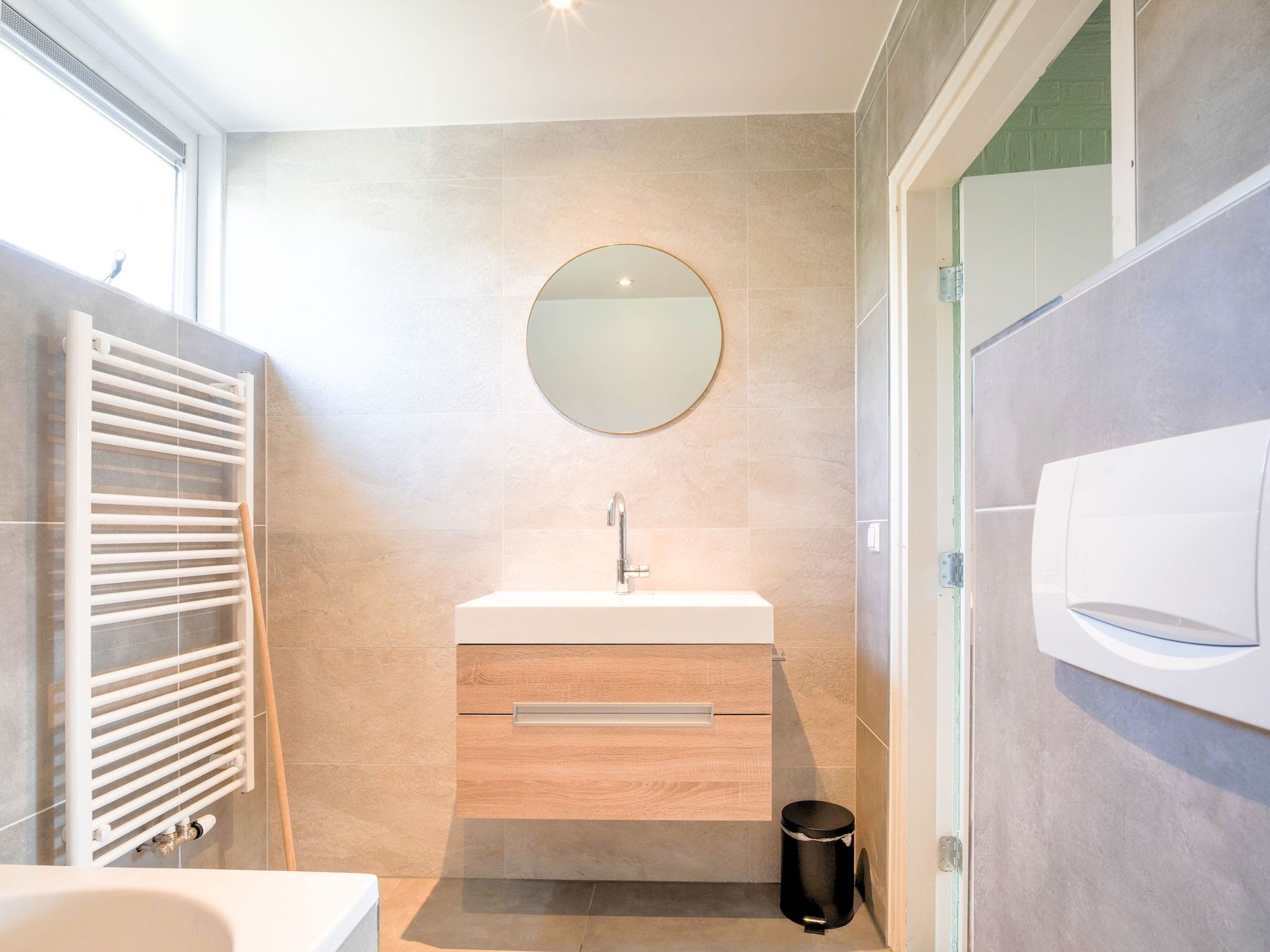 De badkamer van Bungalow 64 en 65 in Stramproy