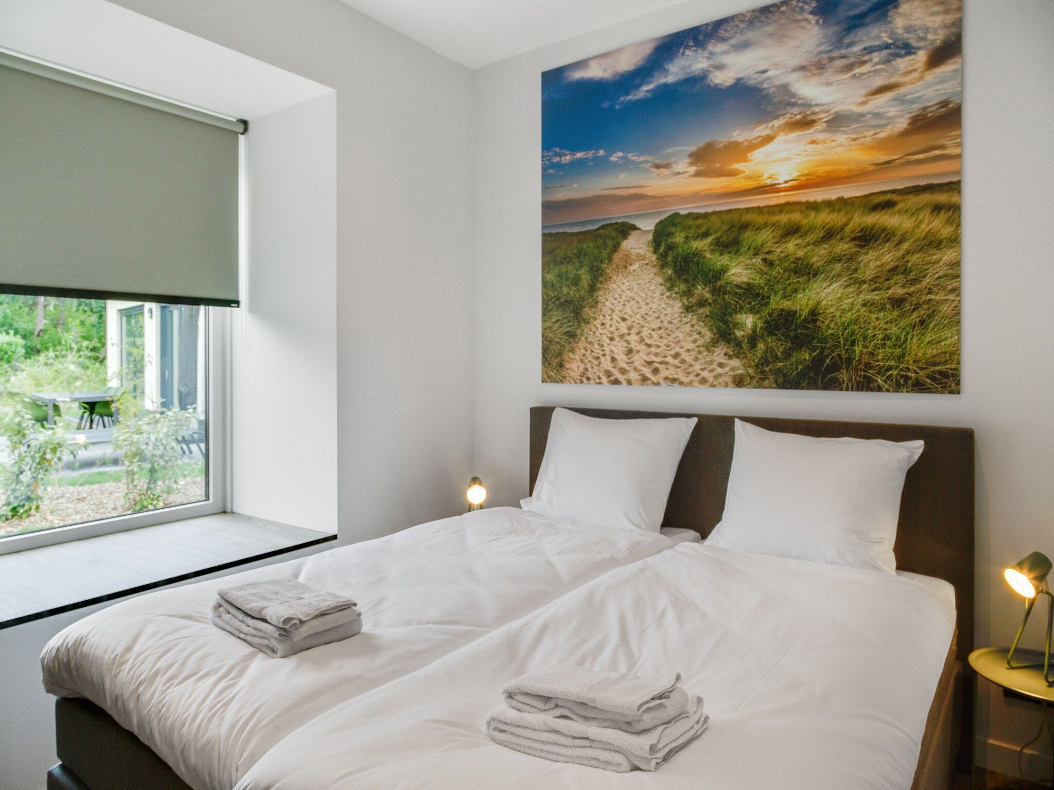 Een slaapkamer van De Koog nr 2 - 6 pers woning de luxe in De Koog Texel North Holland