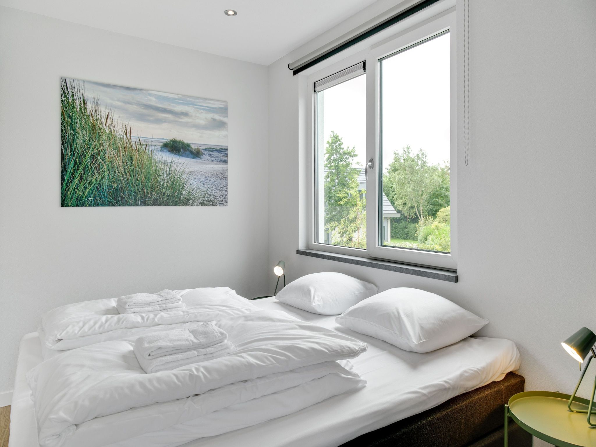 Een slaapkamer van De Koog nr 2 - 6 pers woning de luxe in De Koog Texel North Holland