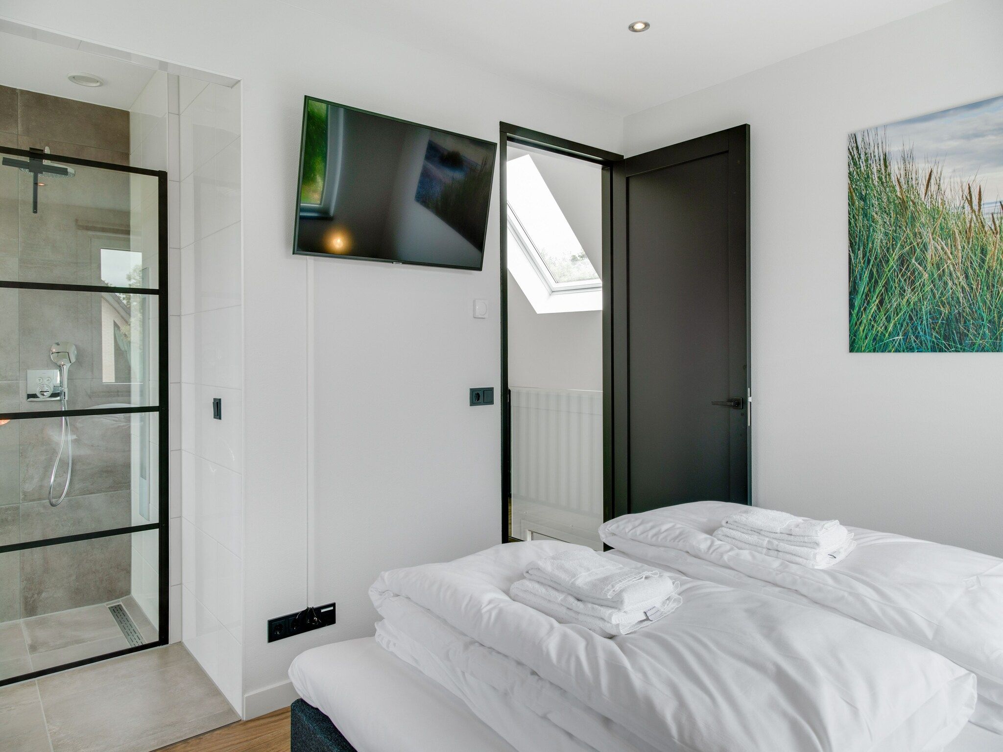 Een slaapkamer van De Koog nr 2 - 6 pers woning de luxe in De Koog Texel North Holland