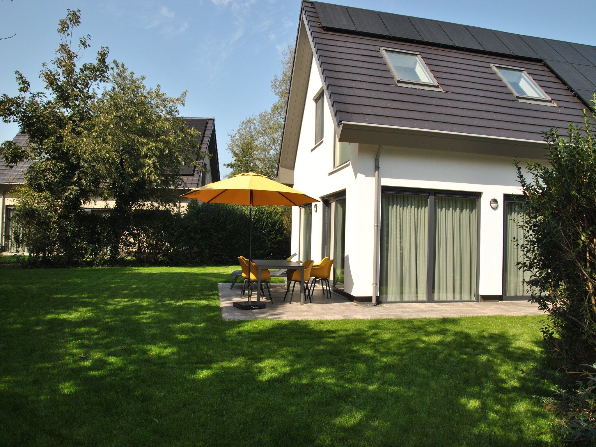 De tuin van De Koog nr 2 - 6 pers woning de luxe in De Koog Texel North Holland