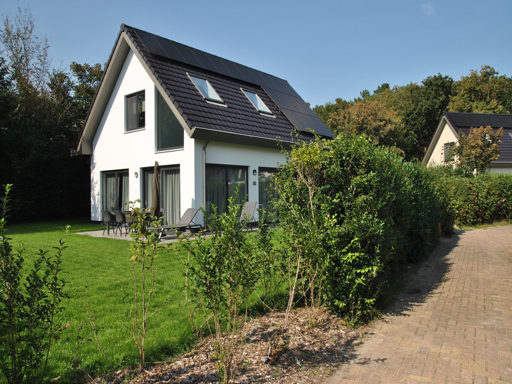 De buitenkant van De Koog  nr 5 - 6 pers woning de luxe in De Koog Texel