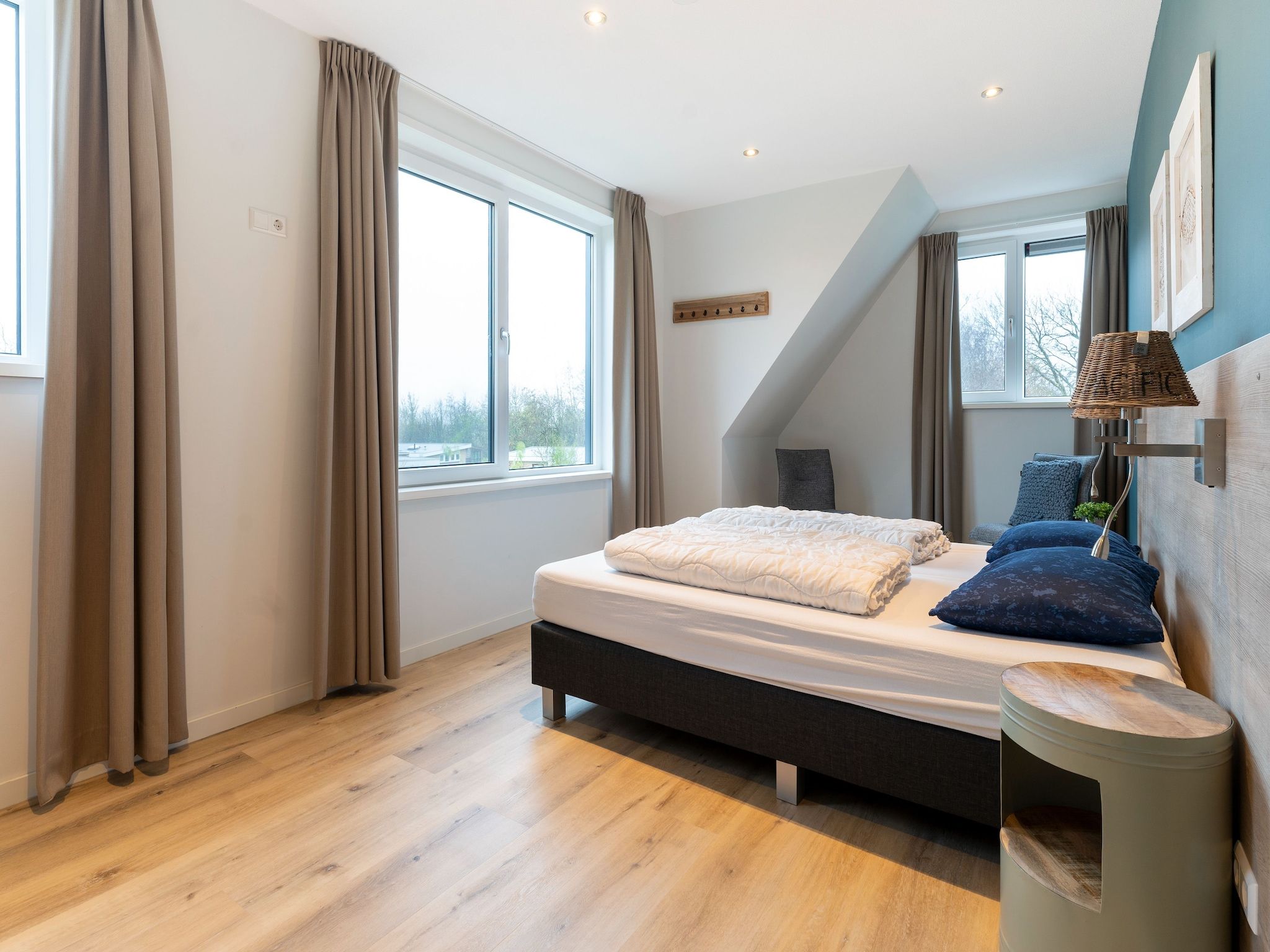 Een slaapkamer van So What 15 in De Koog Texel