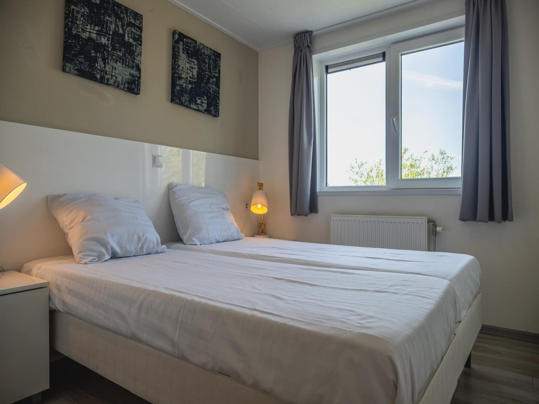 Een slaapkamer van Beemsterdijk met Sauna  10 personen in West-Graftdijk