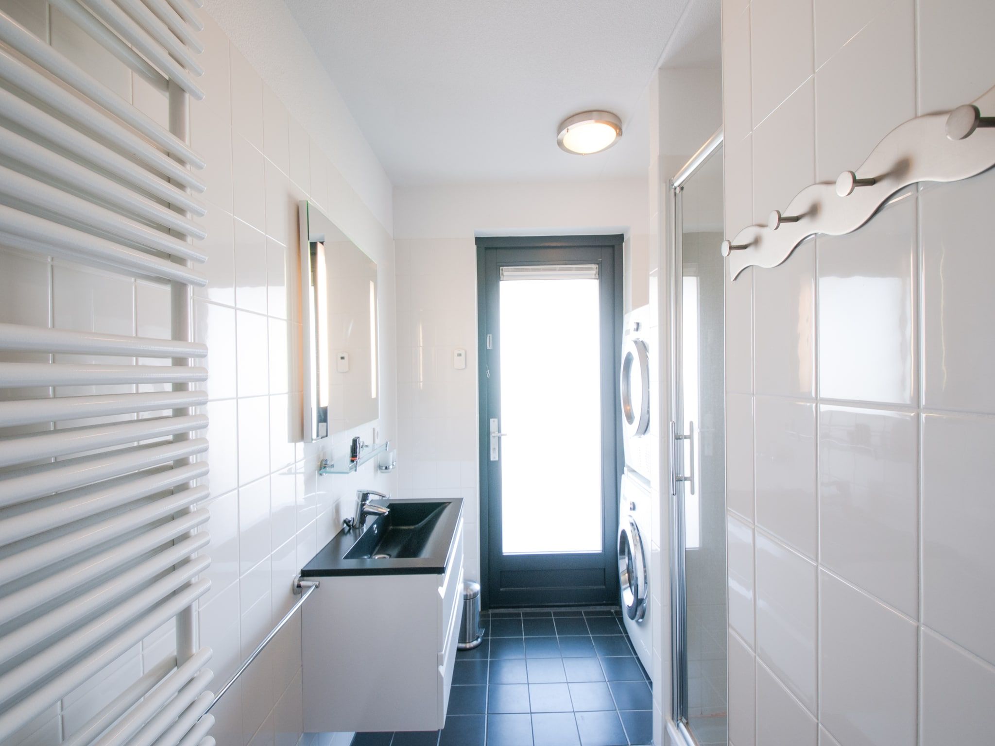 De badkamer van Resort Waterrijk Oesterdam 8 in Tholen