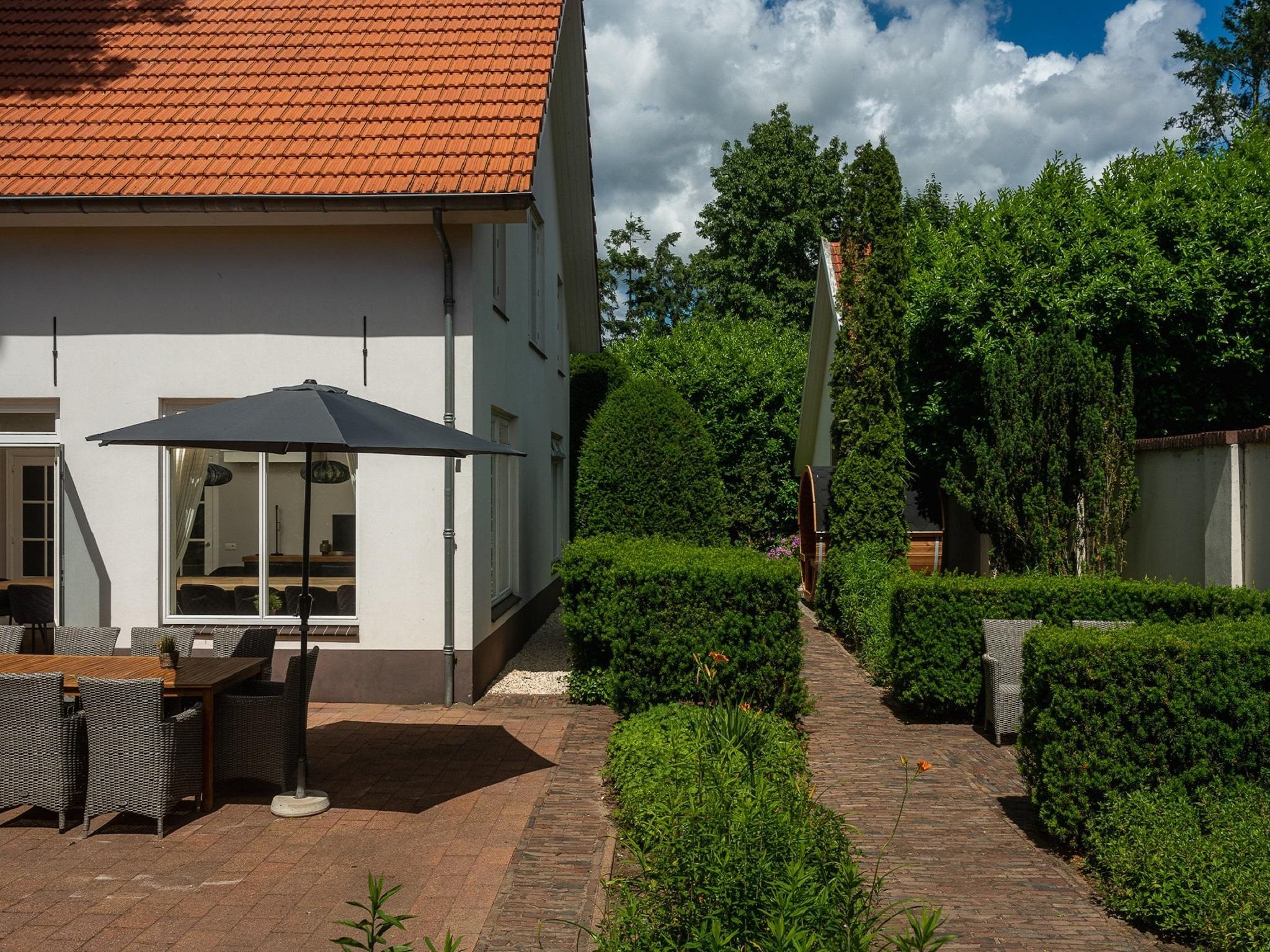De tuin van Landgoed De IJsvogel 10 in Voorthuizen