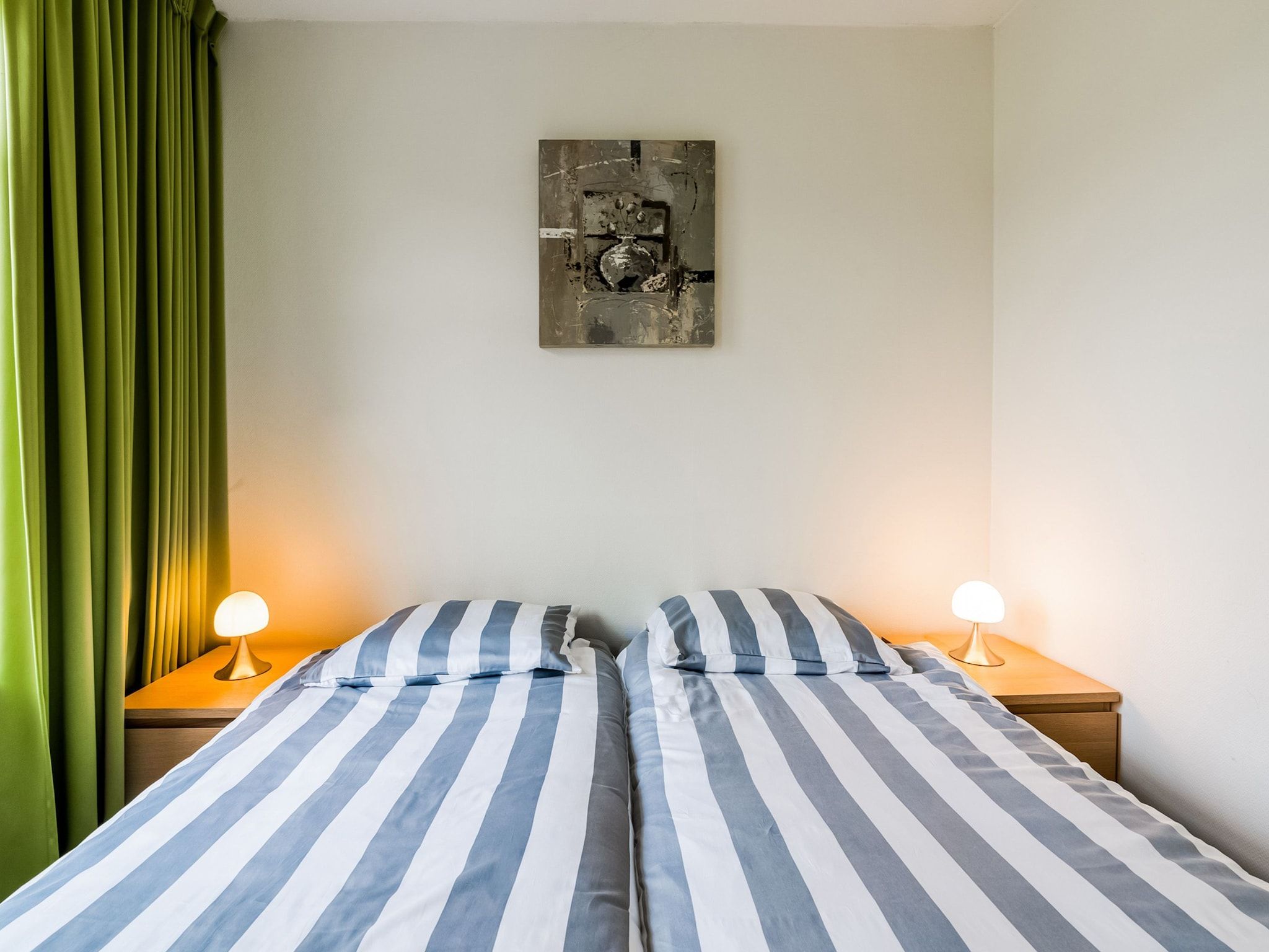 Een slaapkamer van Krokus 18 in Breskens