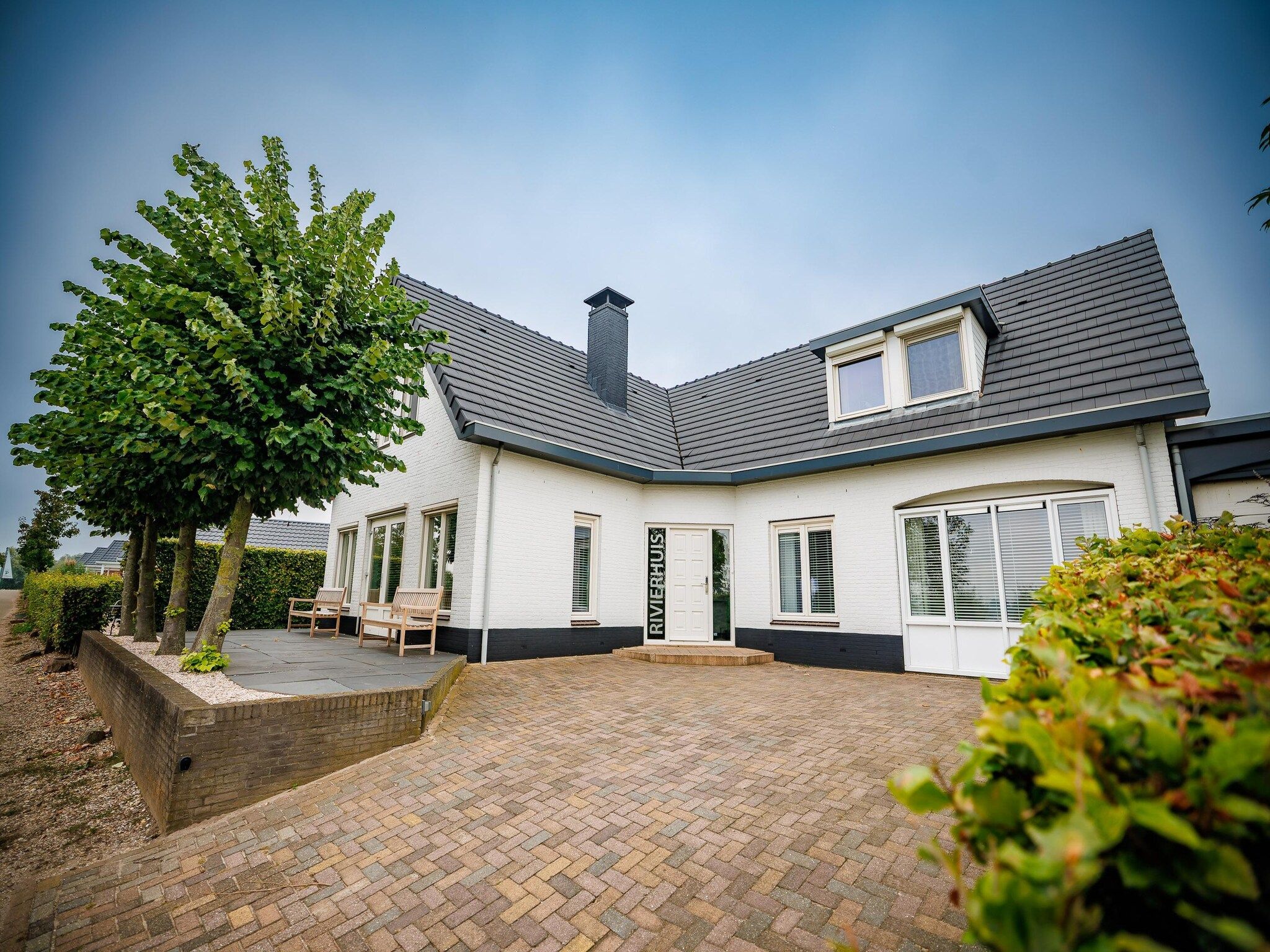 De buitenkant van Vakantiepark Eiland van Maurik 4 in Maurik