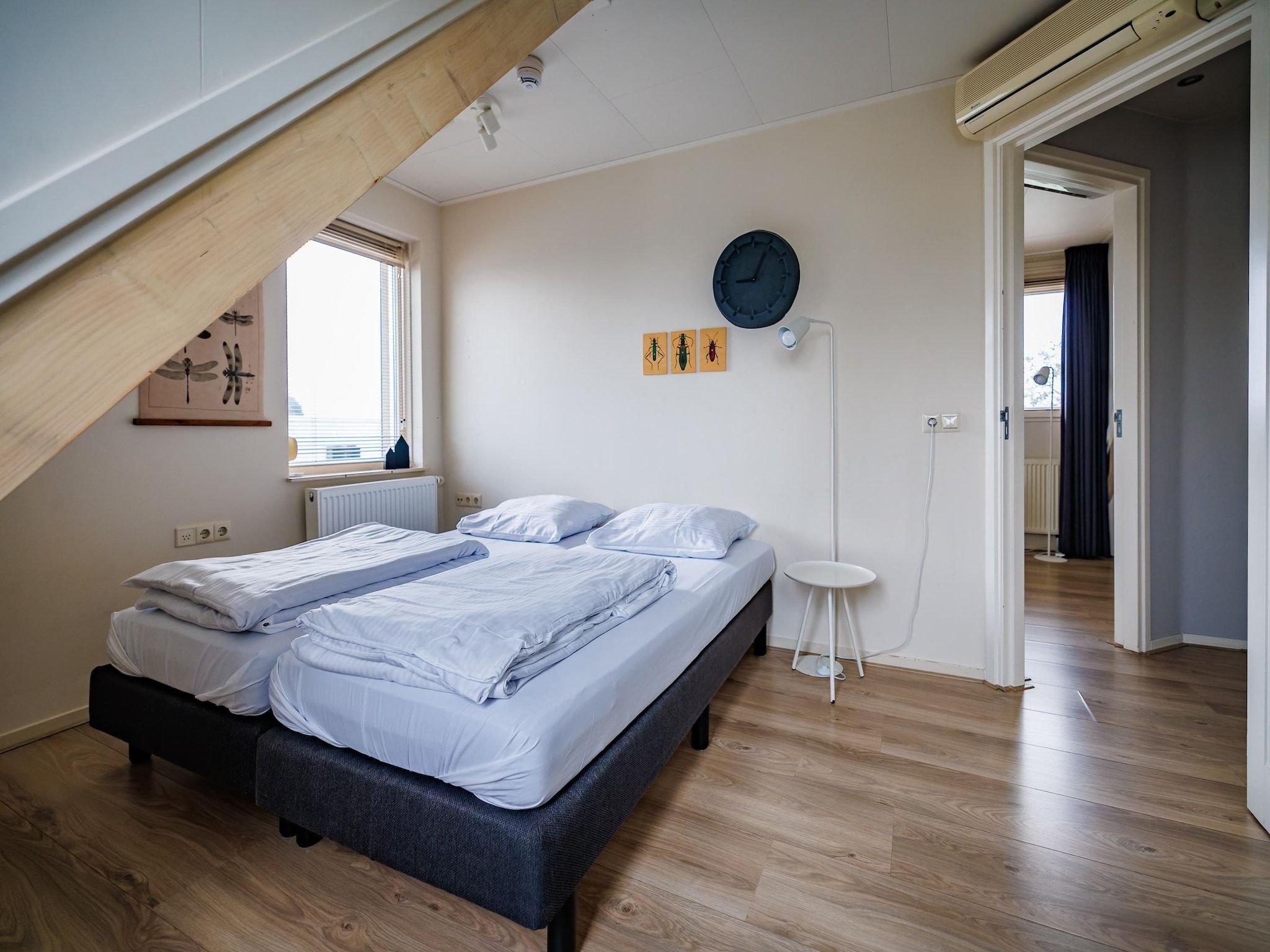 Een slaapkamer van Vakantiepark Eiland van Maurik 4 in Maurik
