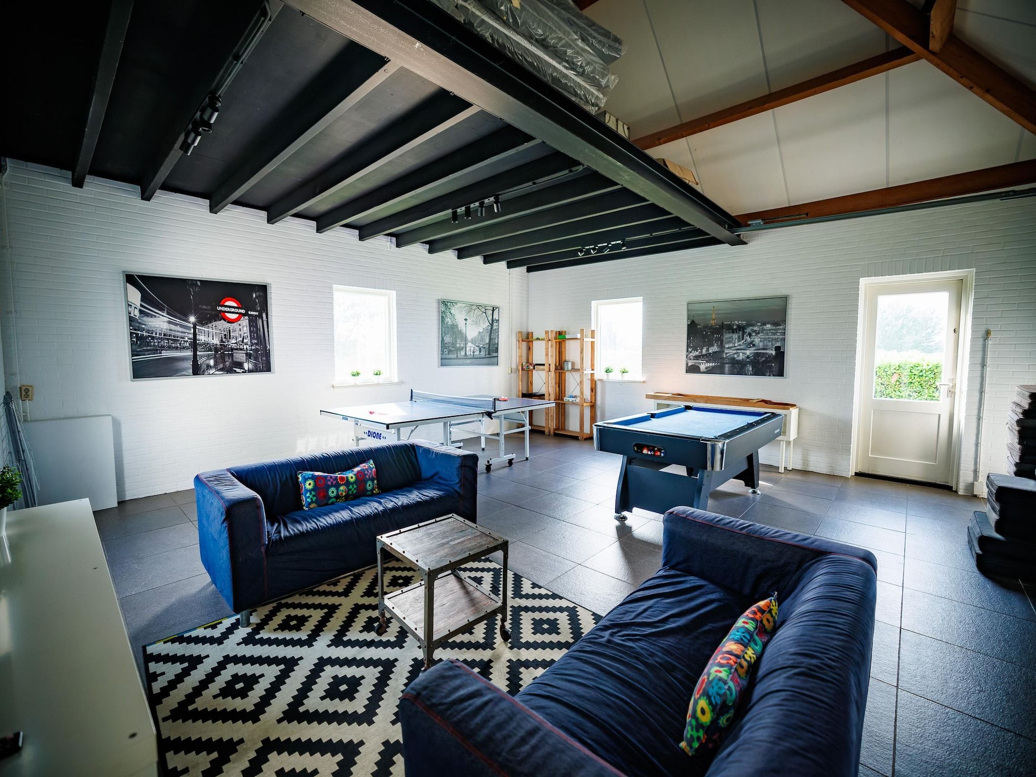 De woonkamer van Vakantiepark Eiland van Maurik 5 in Maurik