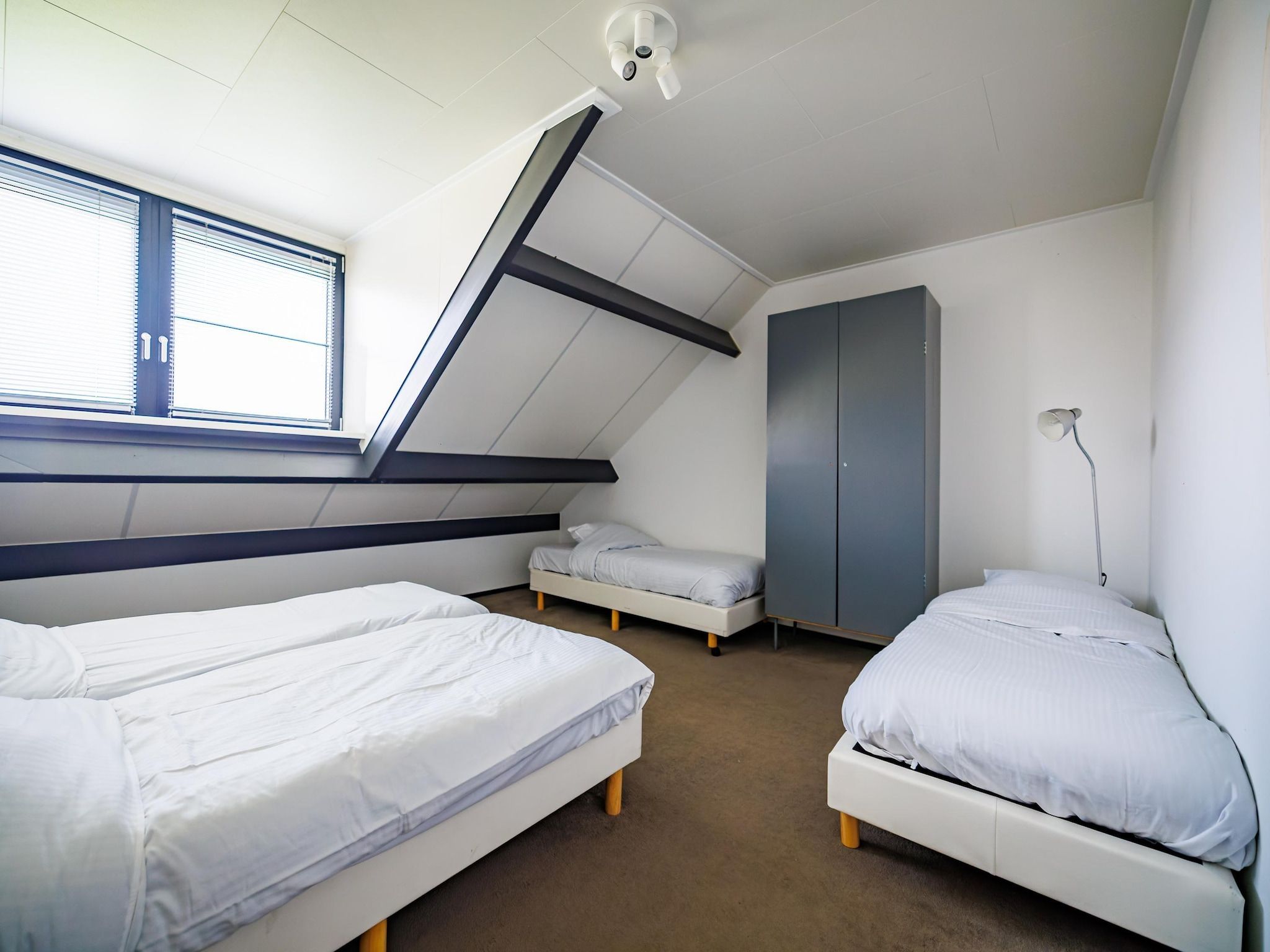 Een slaapkamer van Vakantiepark Eiland van Maurik 5 in Maurik