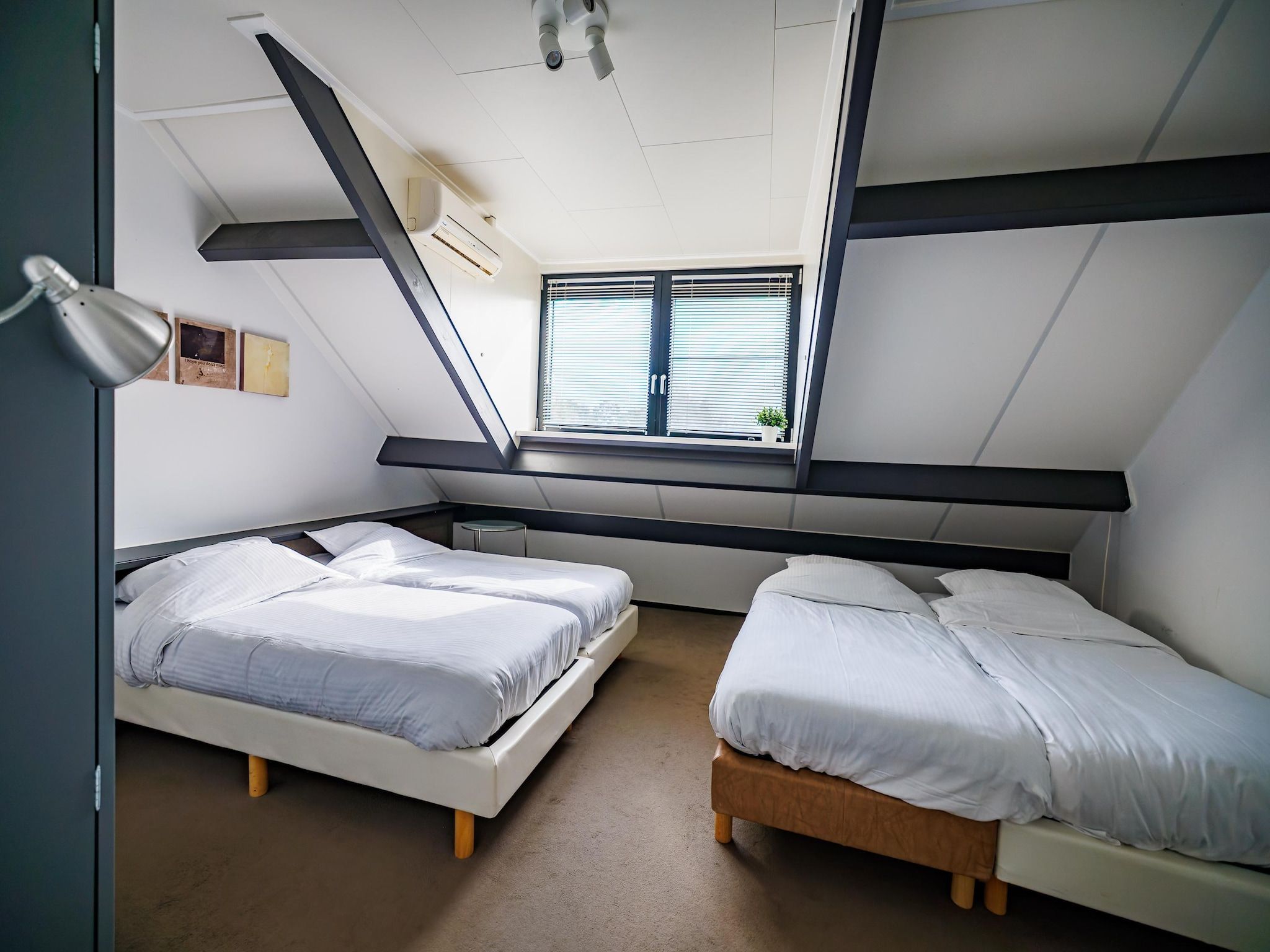 Een slaapkamer van Vakantiepark Eiland van Maurik 5 in Maurik