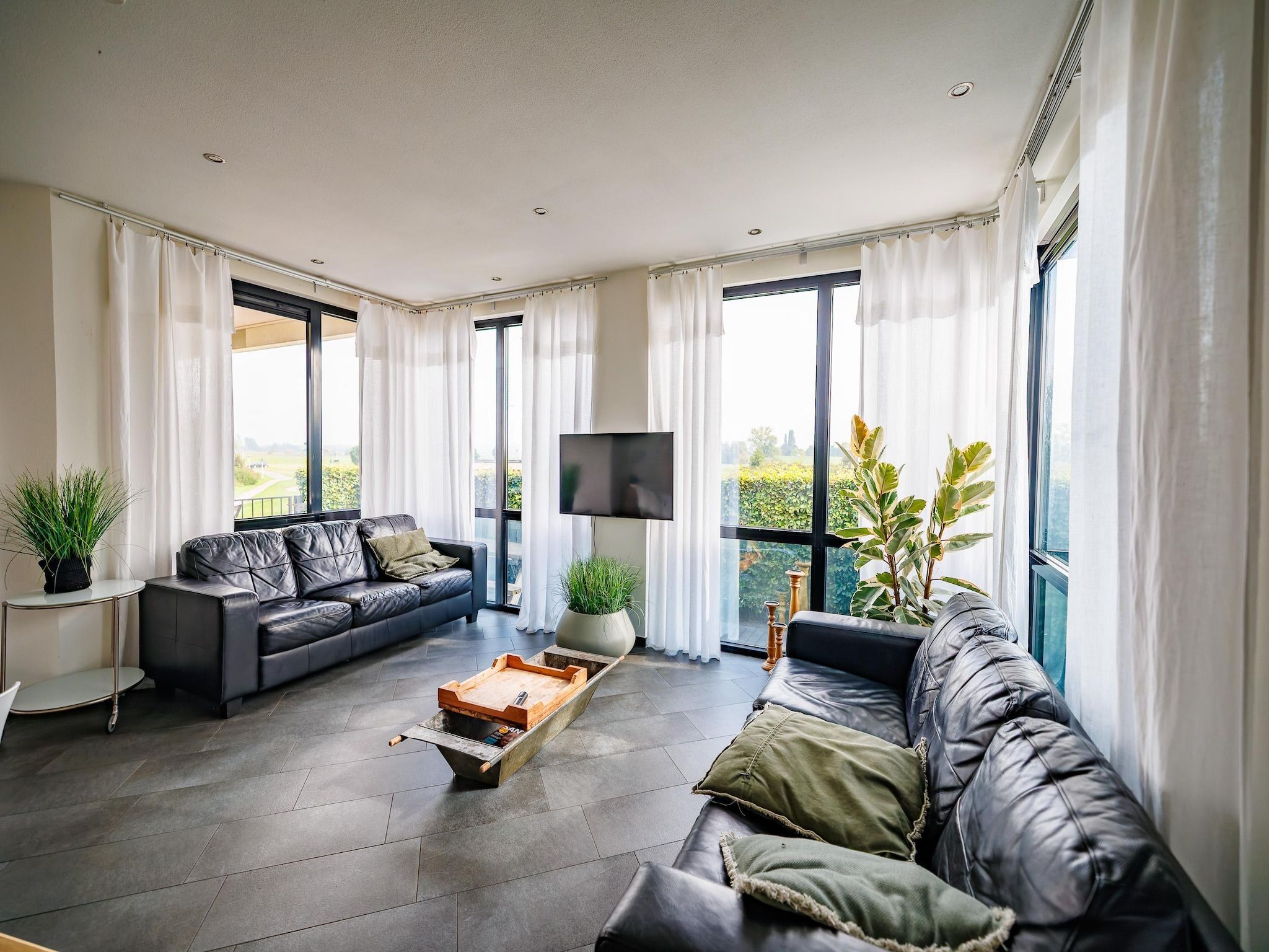 De woonkamer van Vakantiepark Eiland van Maurik 6 in Maurik