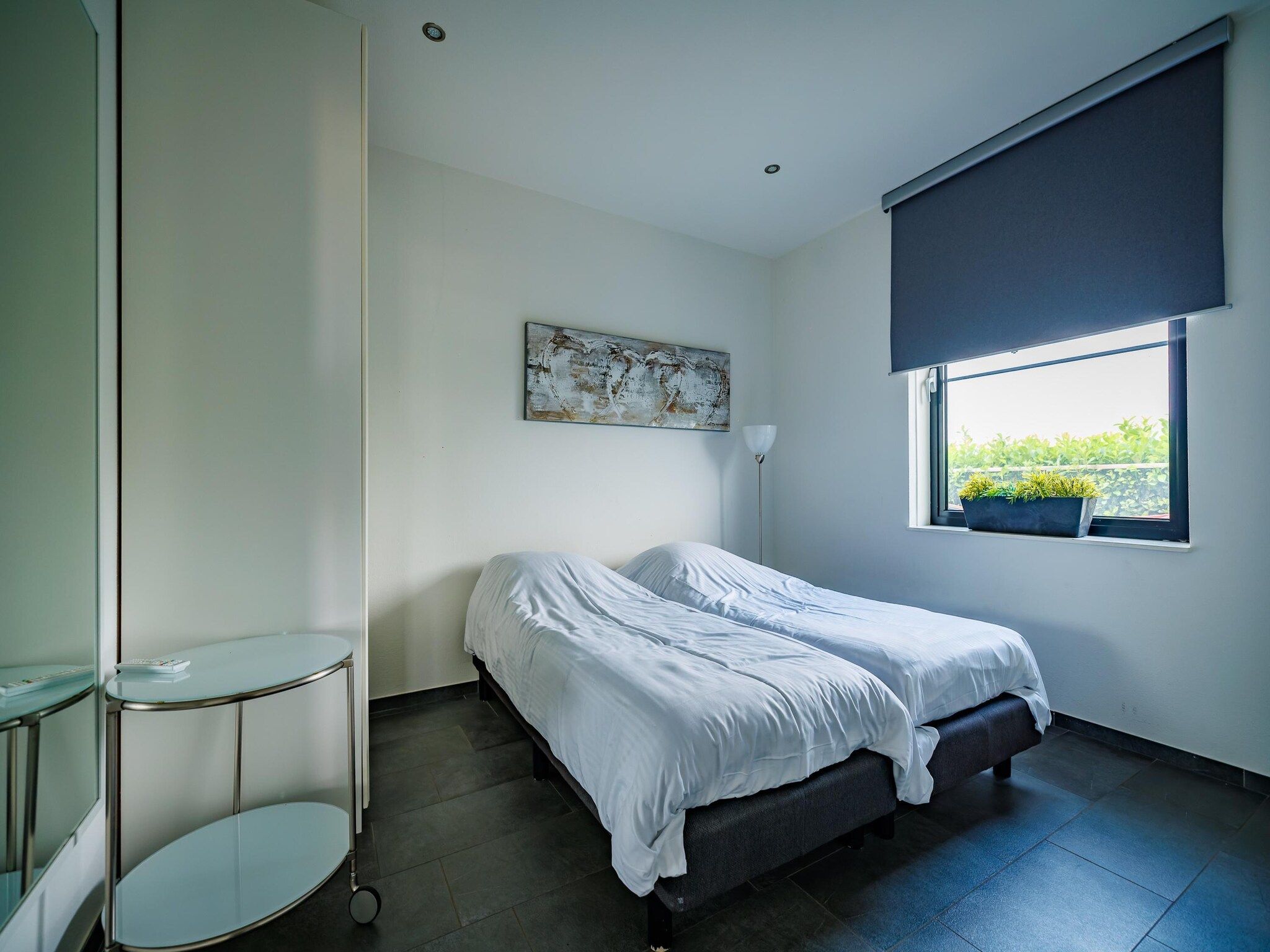 Een slaapkamer van Vakantiepark Eiland van Maurik 6 in Maurik