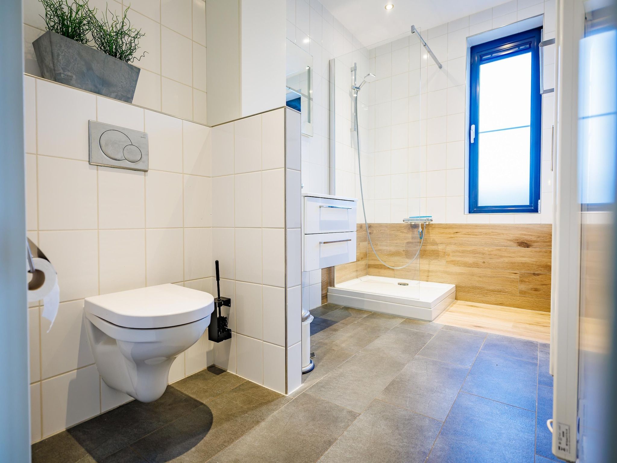 De badkamer van Vakantiepark Eiland van Maurik 6 in Maurik