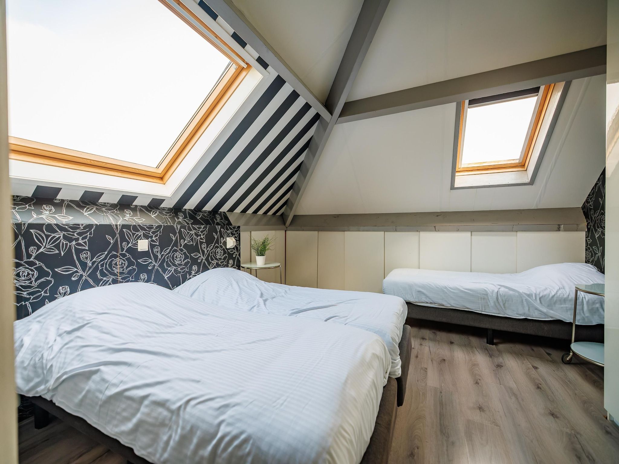 Een slaapkamer van Vakantiepark Eiland van Maurik 6 in Maurik