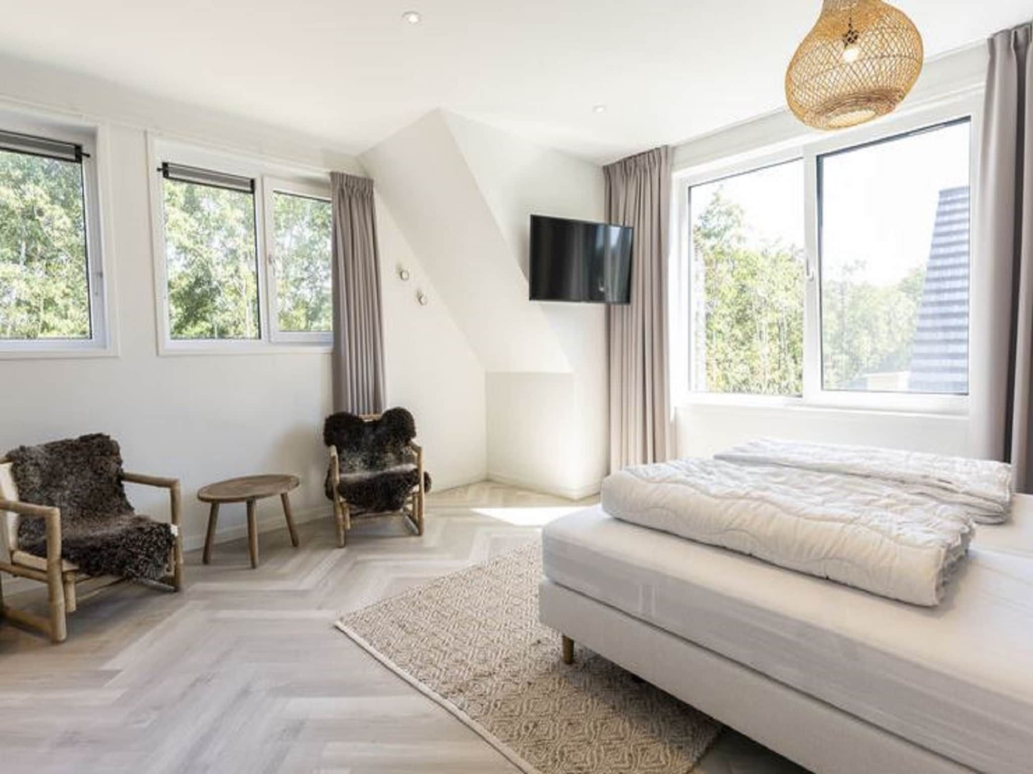 Een slaapkamer van So What 19 in De Koog Texel