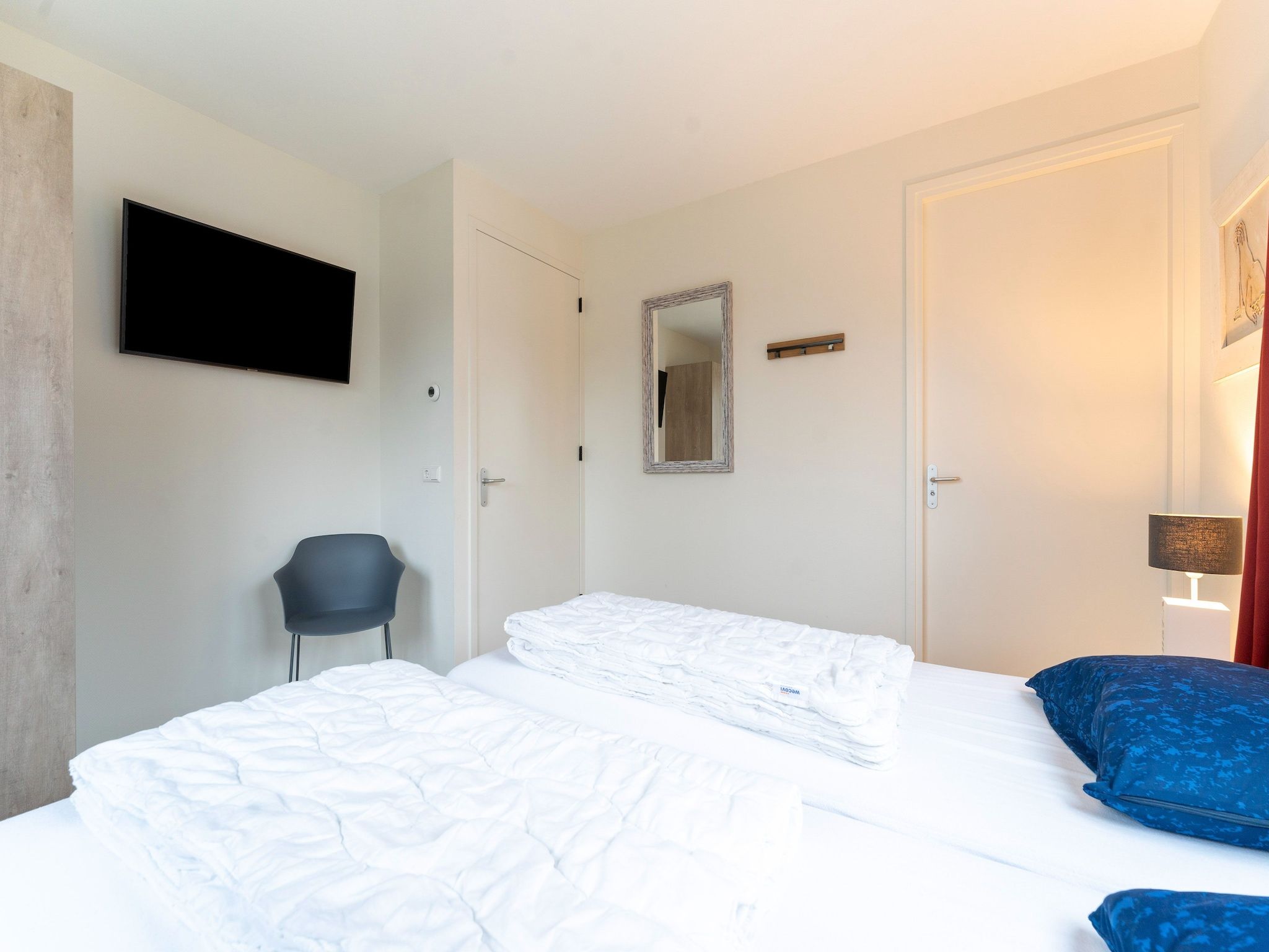 Een slaapkamer van So What 21 in De Koog Texel