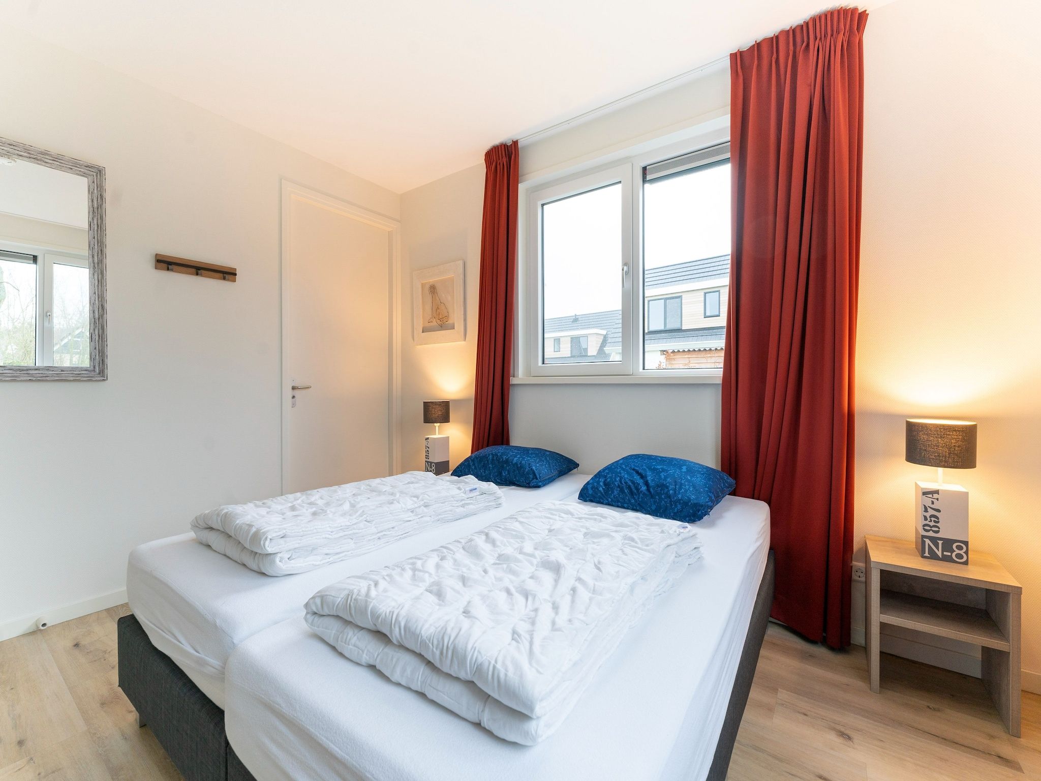 Een slaapkamer van So What 21 in De Koog Texel