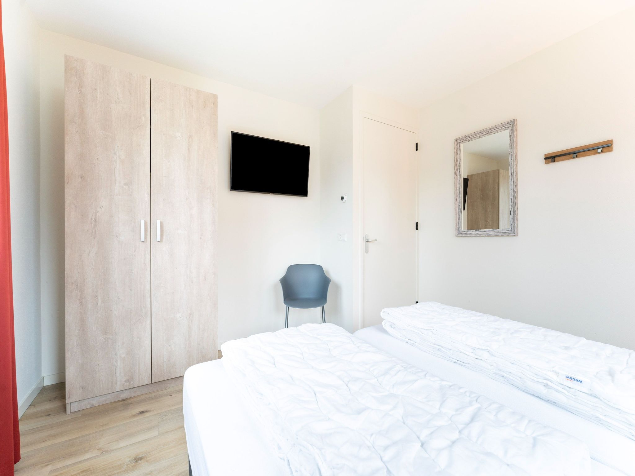 Een slaapkamer van So What 21 in De Koog Texel