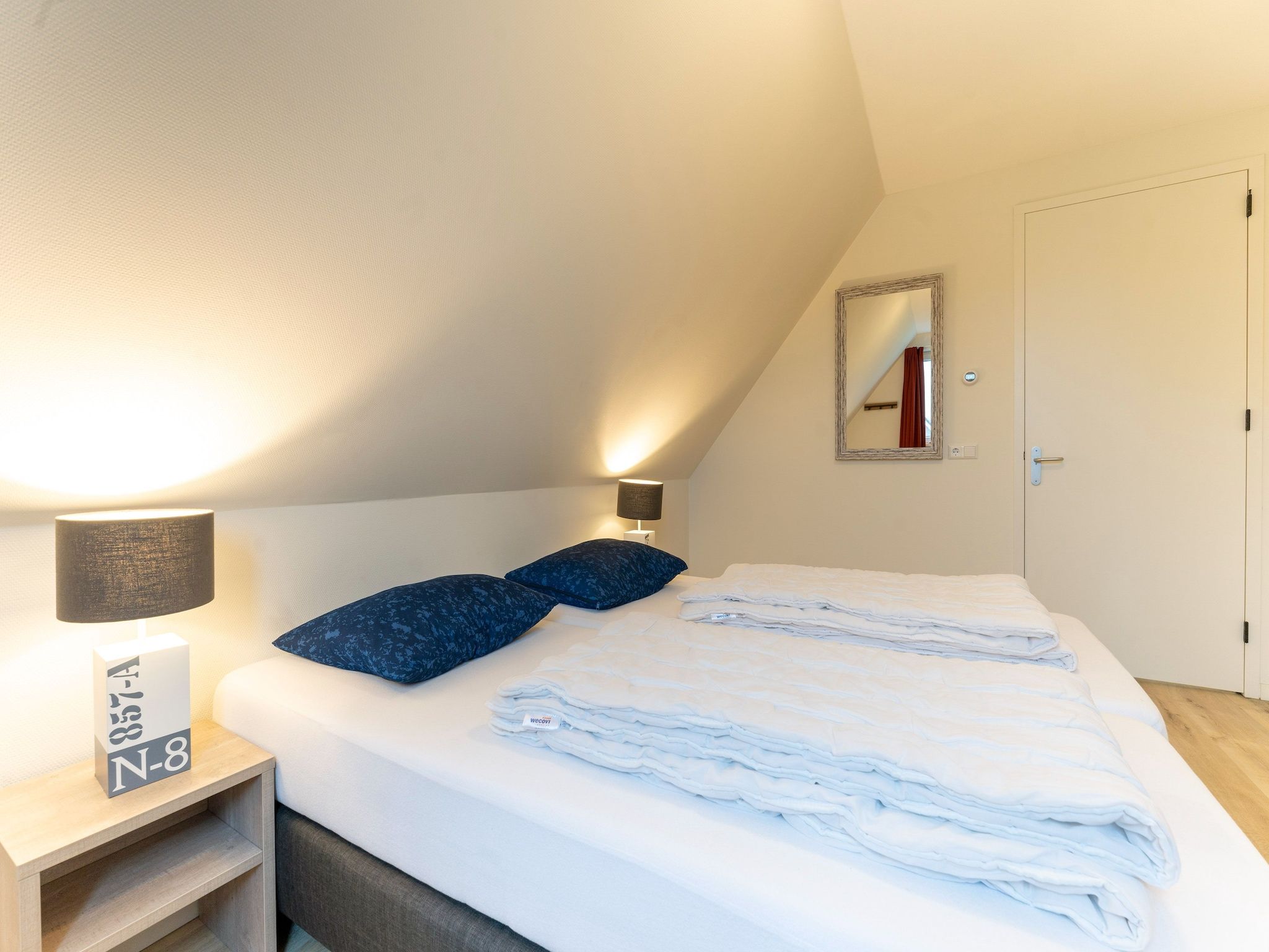 Een slaapkamer van So What 21 in De Koog Texel