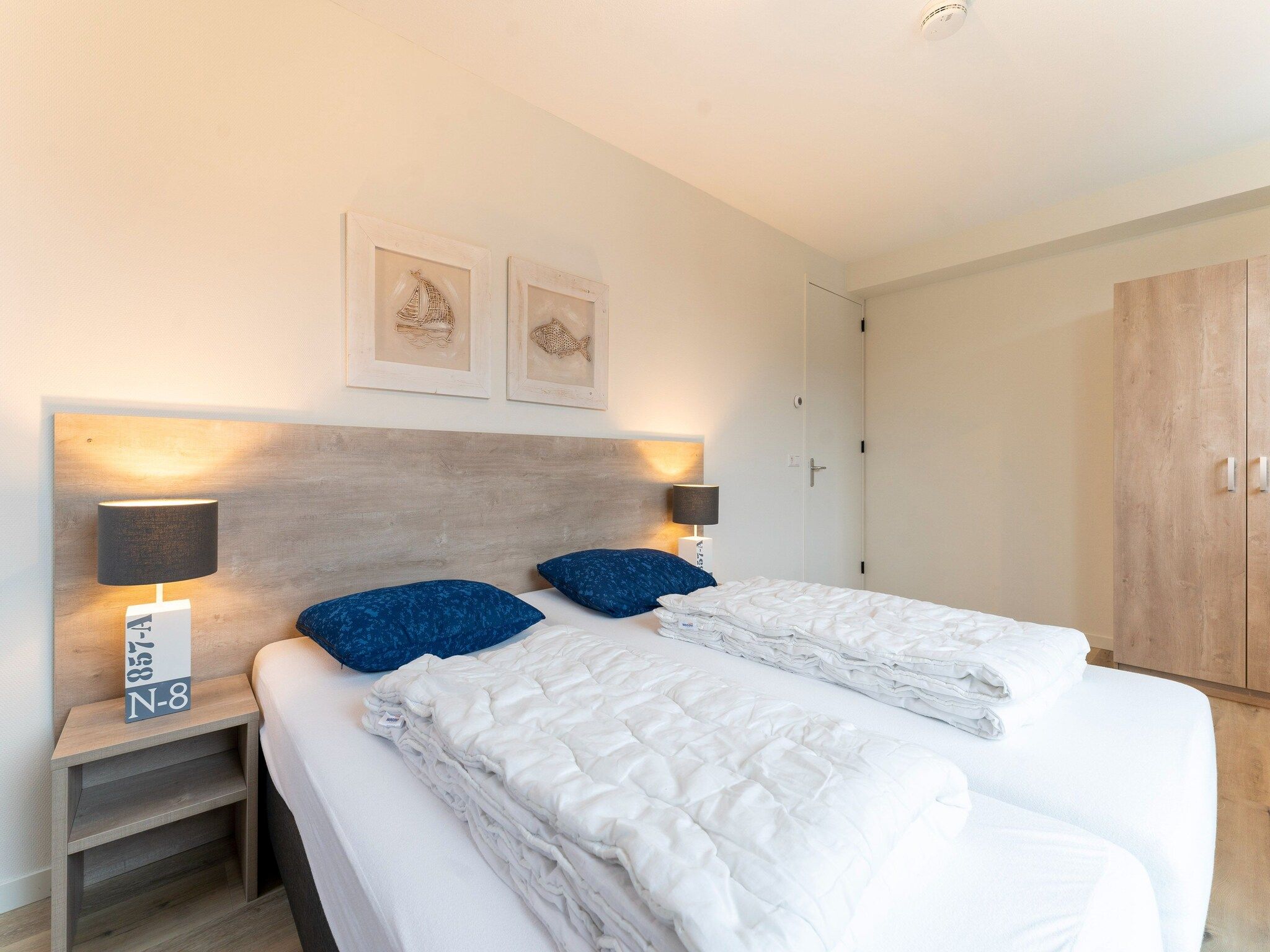 Een slaapkamer van So What 21 in De Koog Texel