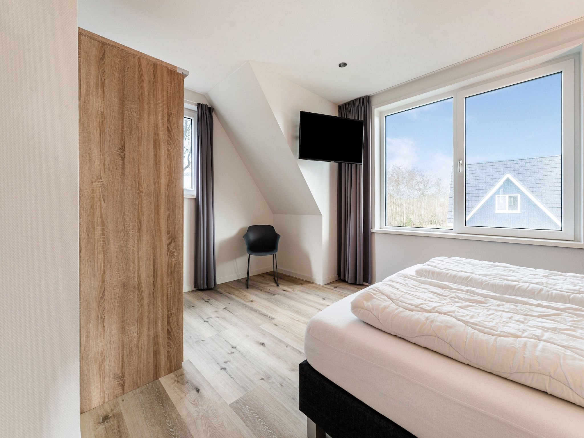 Een slaapkamer van So What 21A in De Koog Texel