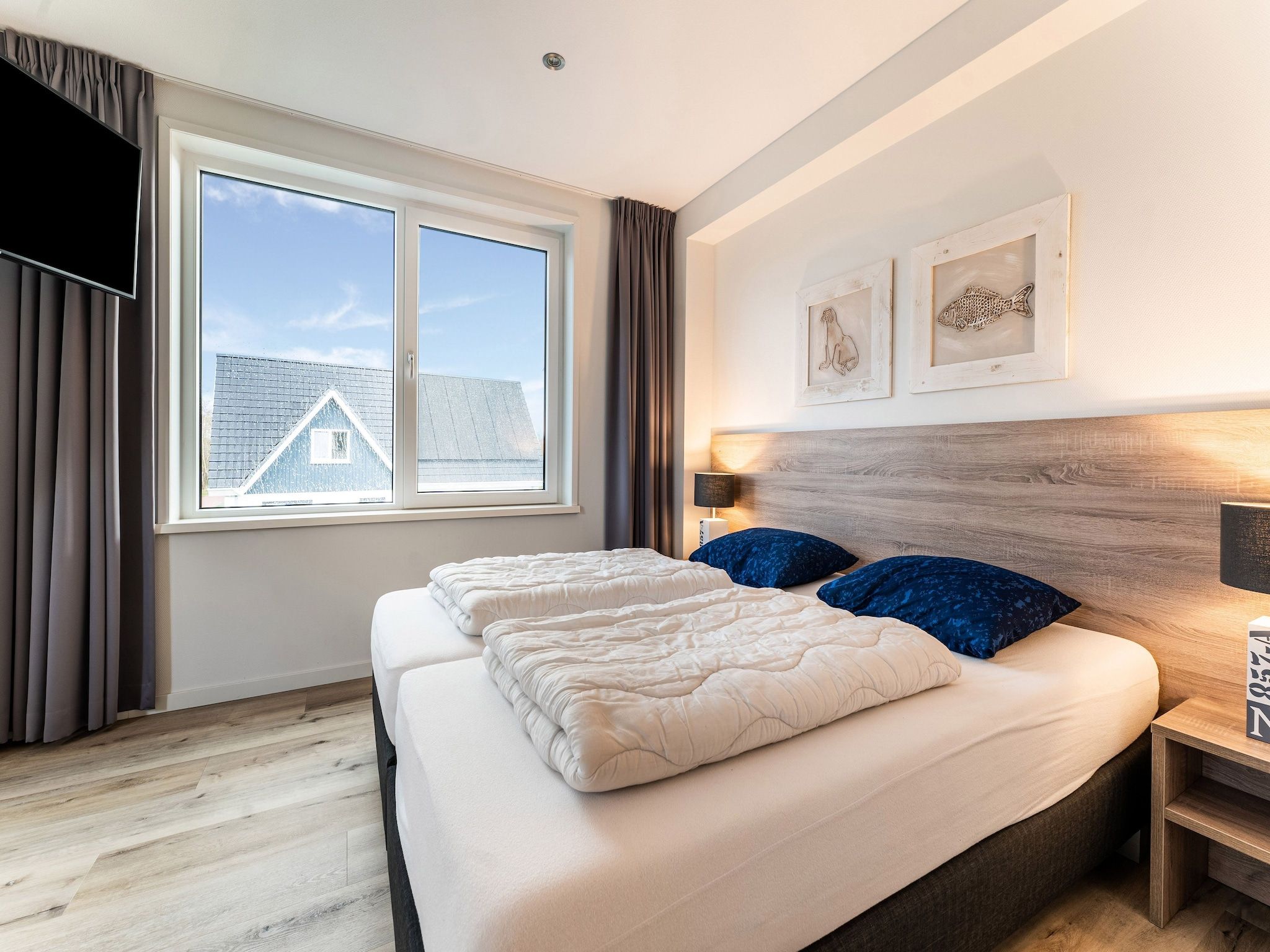 Een slaapkamer van So What 21A in De Koog Texel