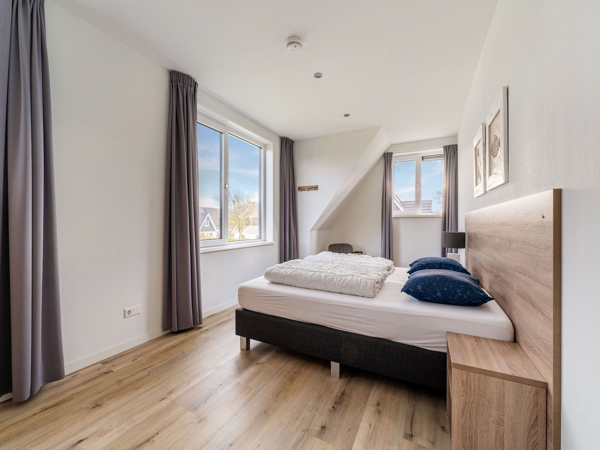 Een slaapkamer van So What 21A in De Koog Texel