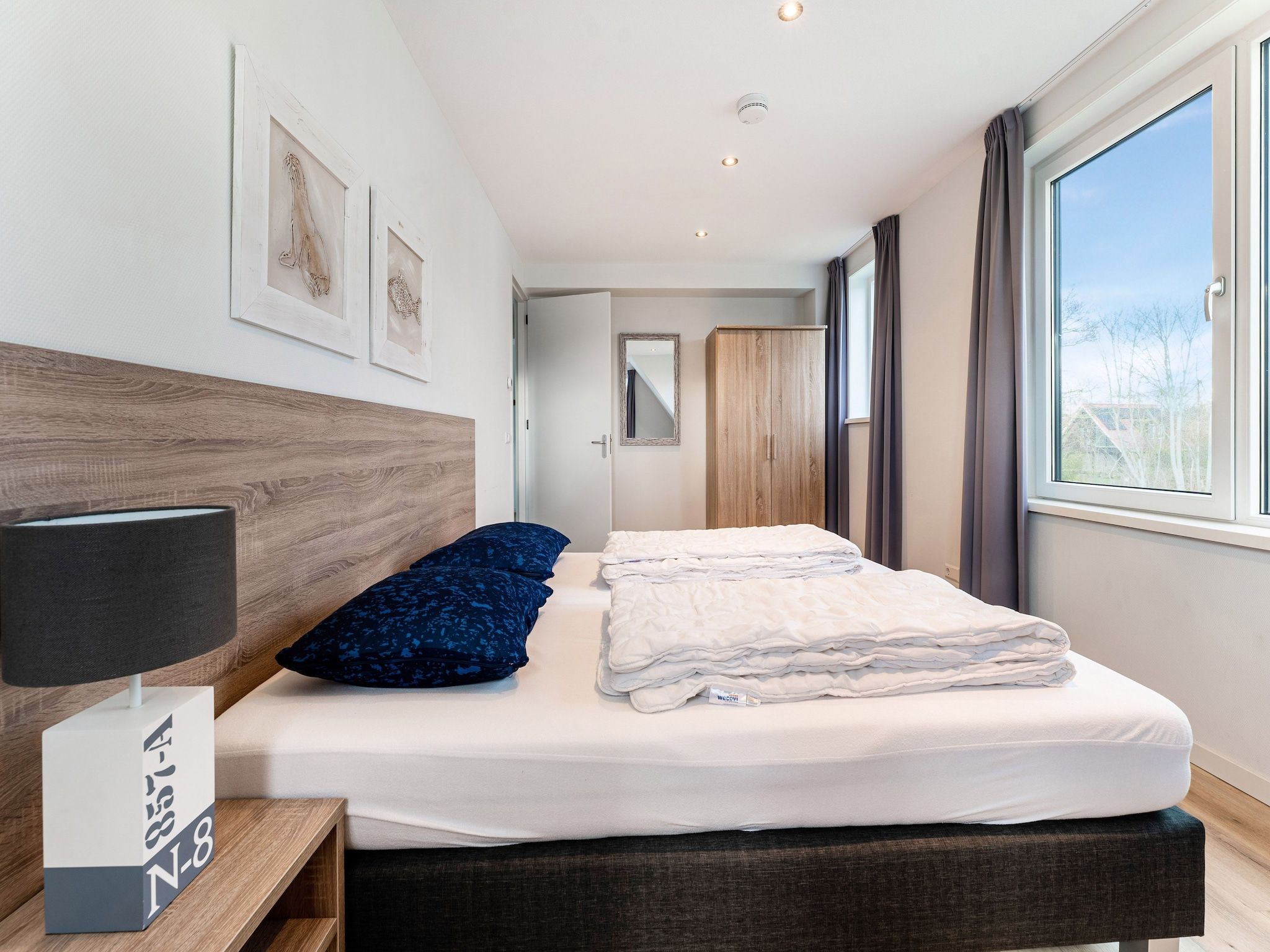 Een slaapkamer van So What 21A in De Koog Texel