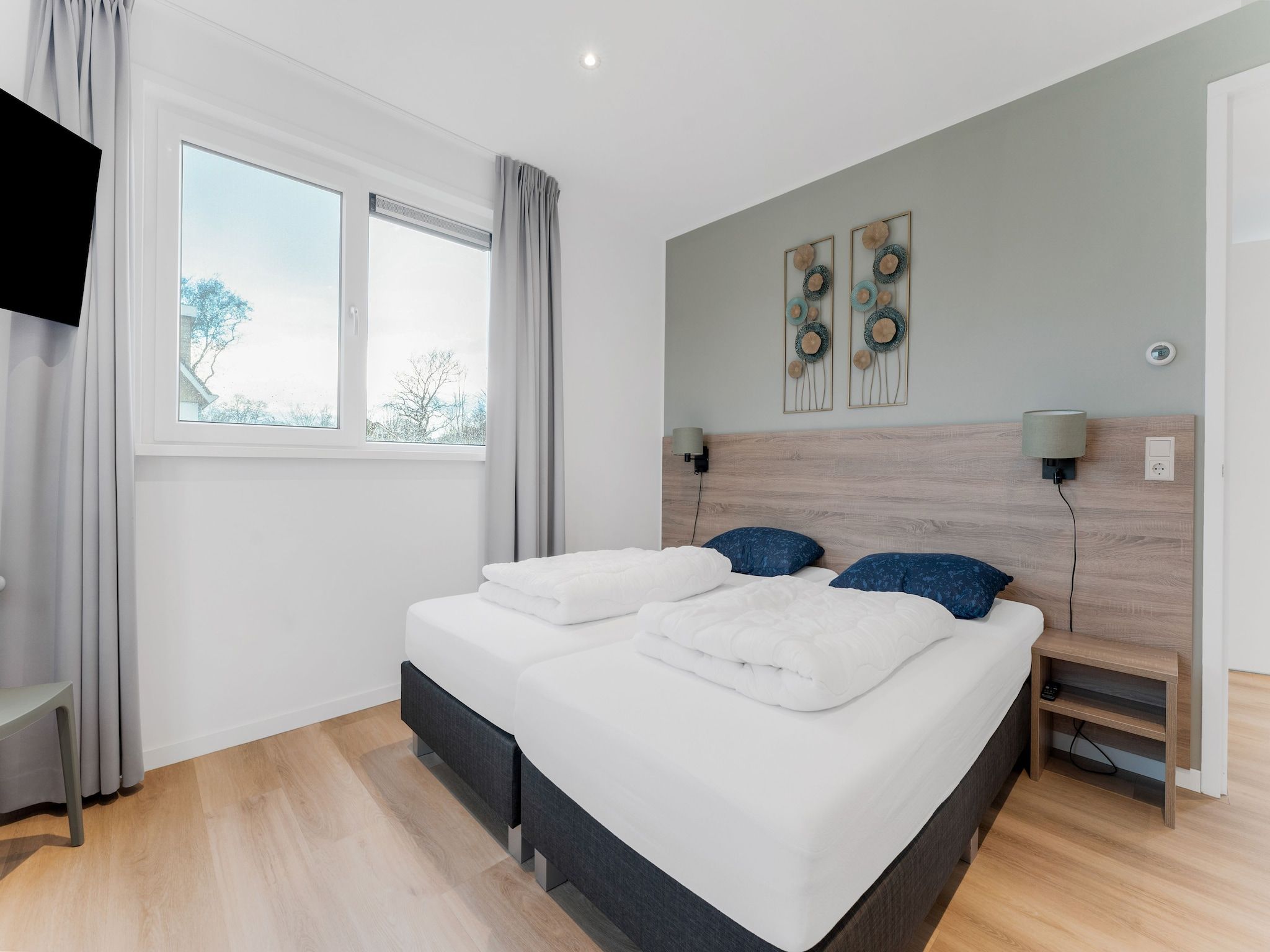 Een slaapkamer van So What 37A in De Koog Texel