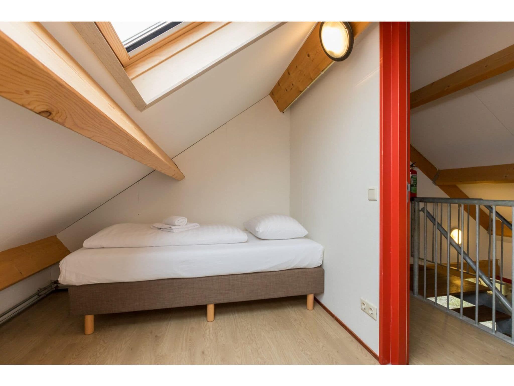 Een slaapkamer van Zonnevylle Duinweg 135 in Zoutelande