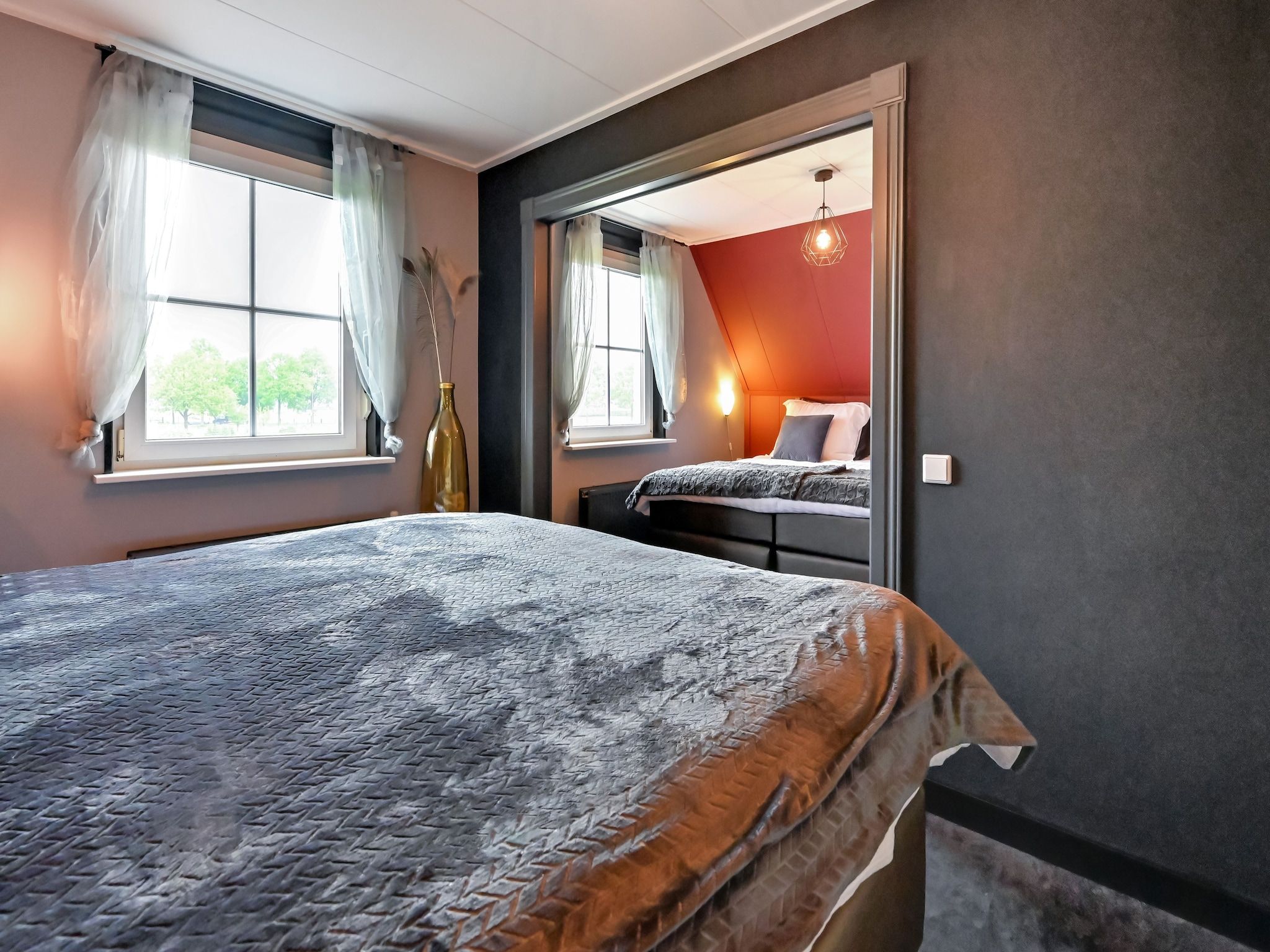 Een slaapkamer van Villa Didam in Didam