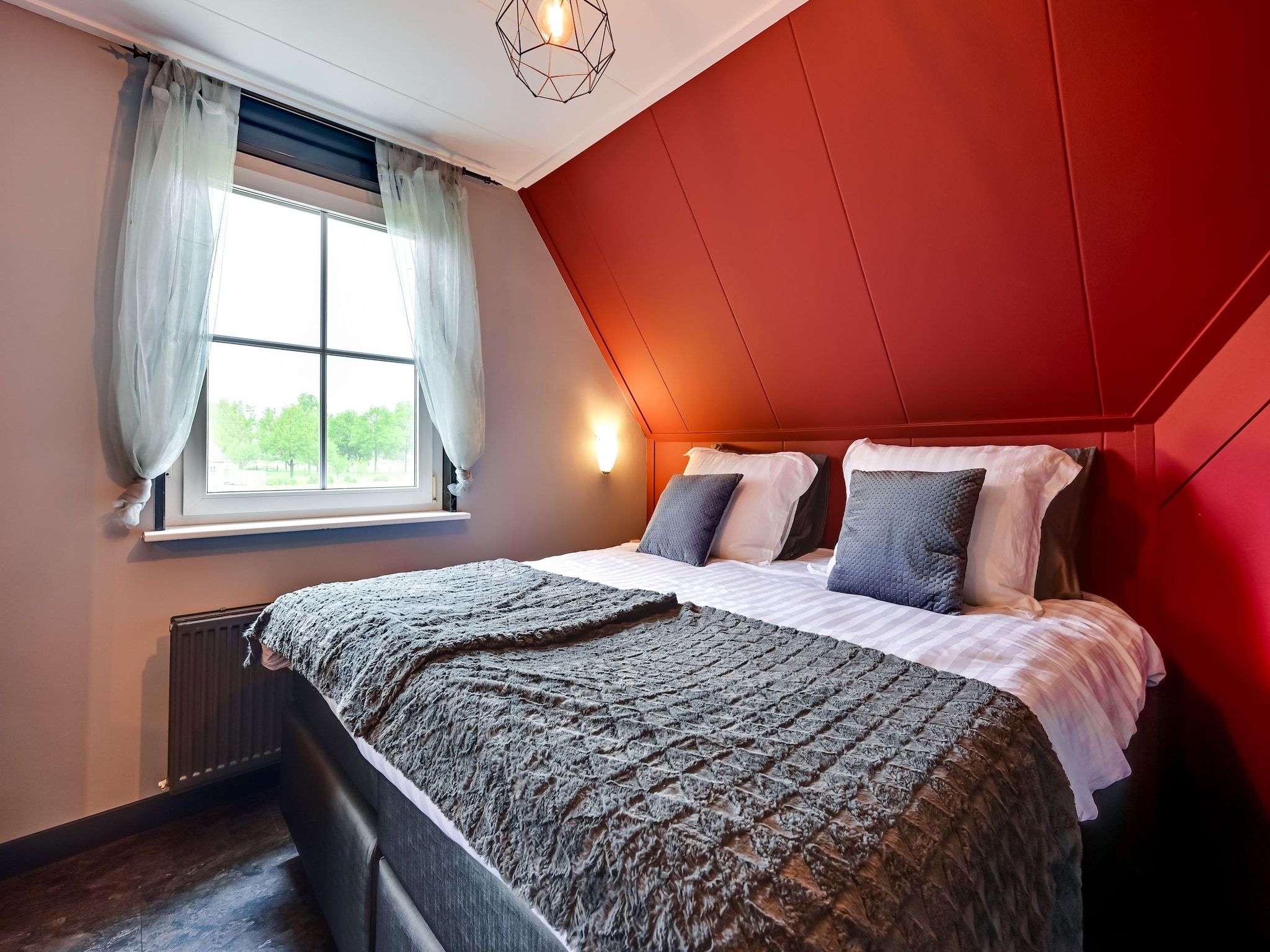 Een slaapkamer van Villa Didam in Didam