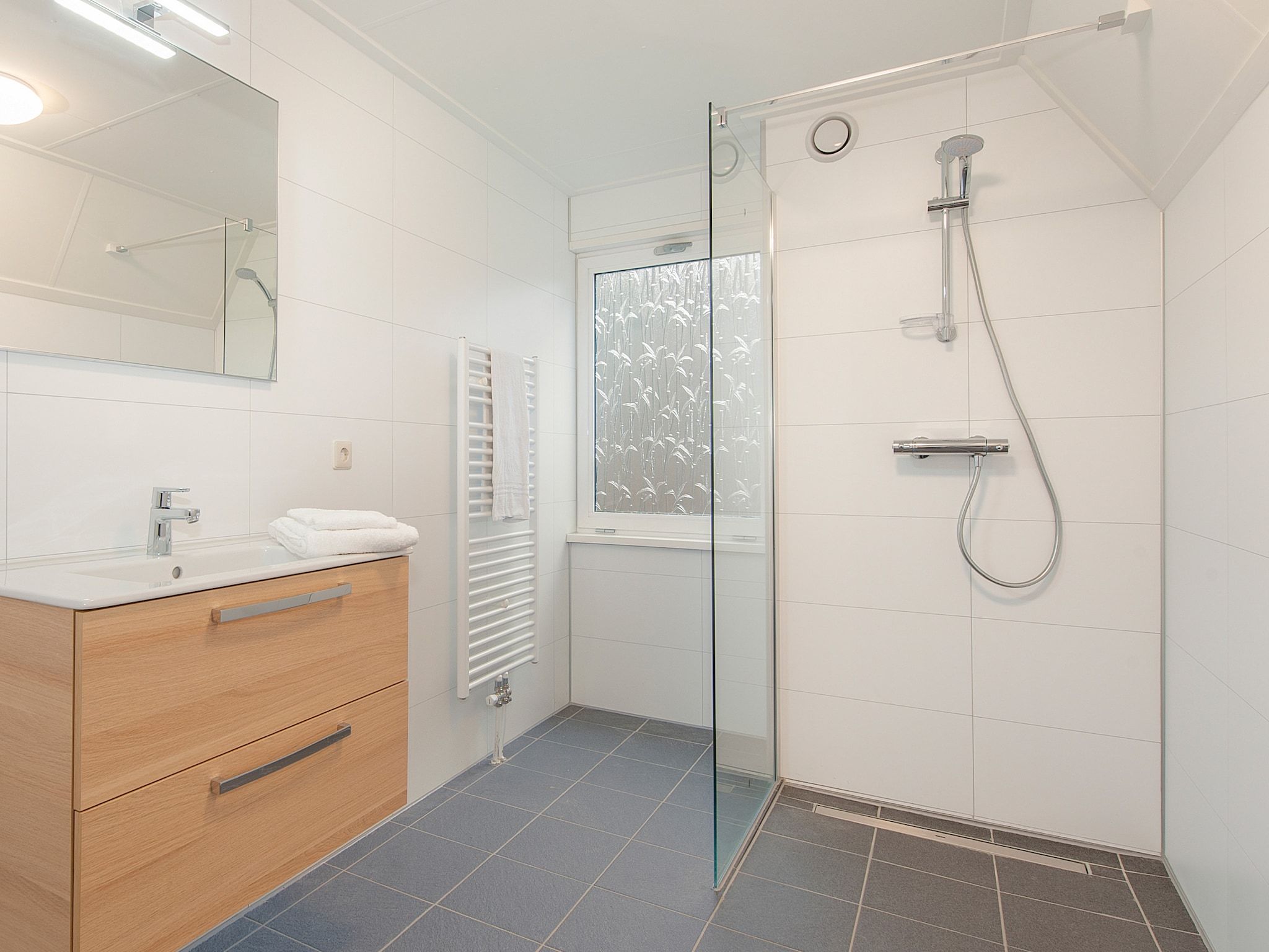 De badkamer van Vakantiepark de Katjeskelder 14 in Oosterhout