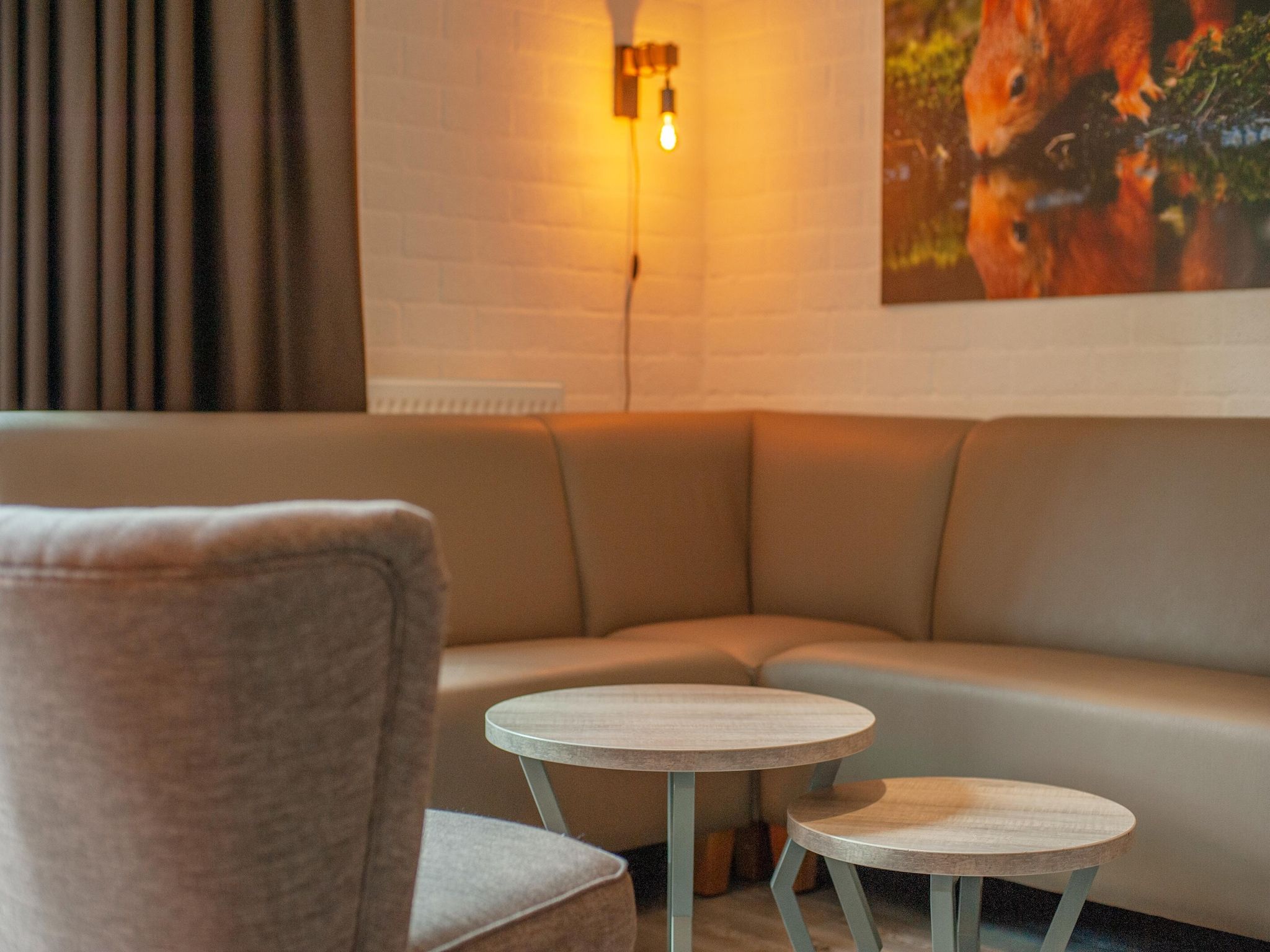 De woonkamer van Vakantiepark de Katjeskelder 14 in Oosterhout