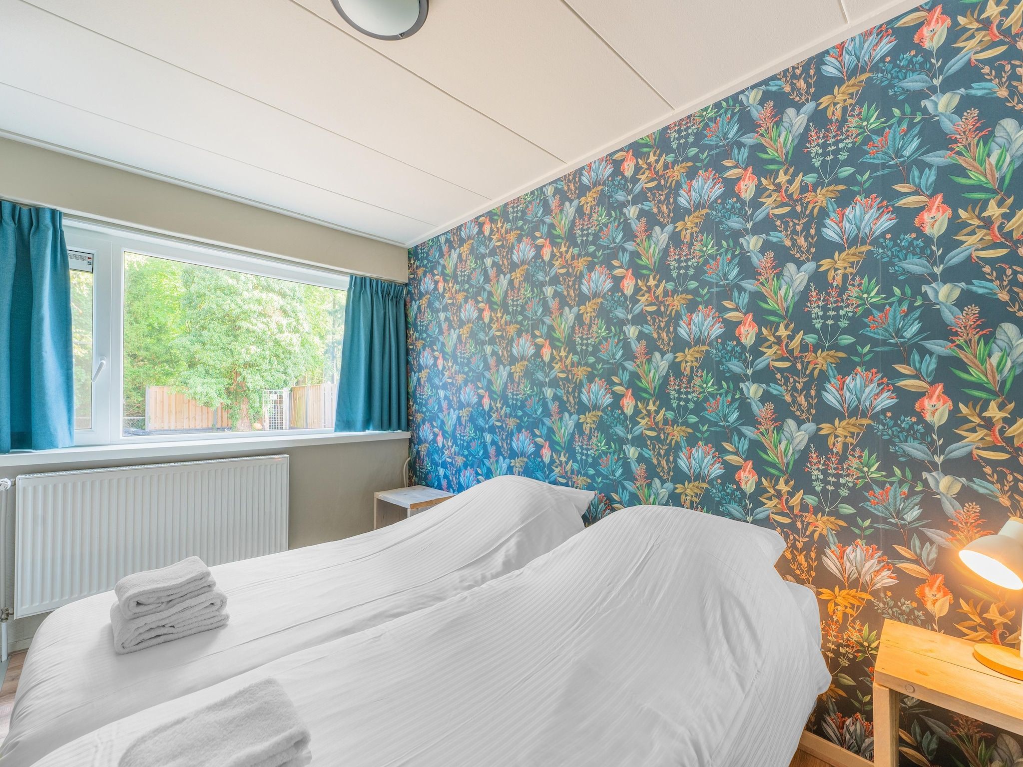 Een slaapkamer van Familiehuis Ruighenrode in Lochem