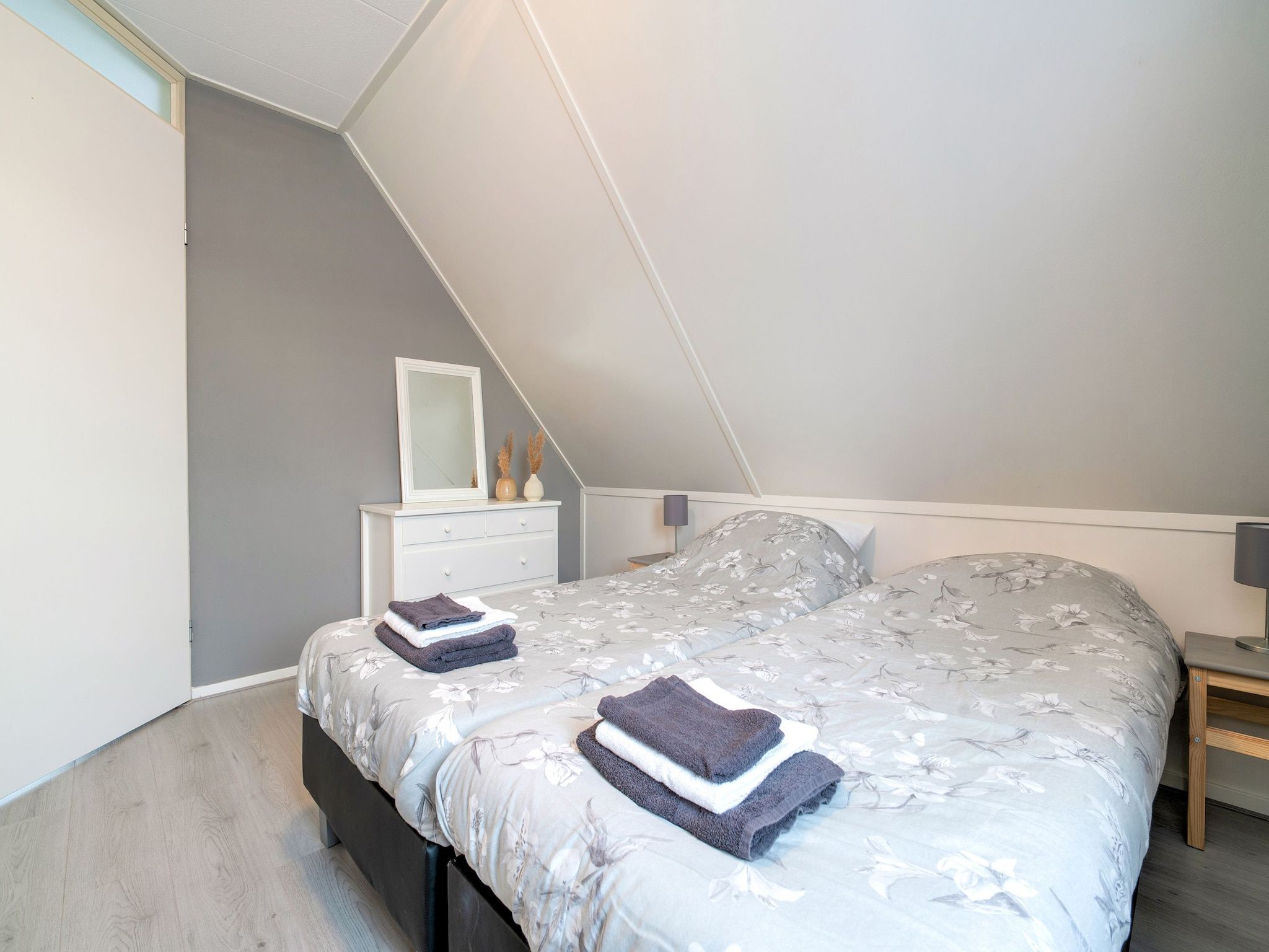 Een slaapkamer van Zonnig Hosterwold in Zeewolde