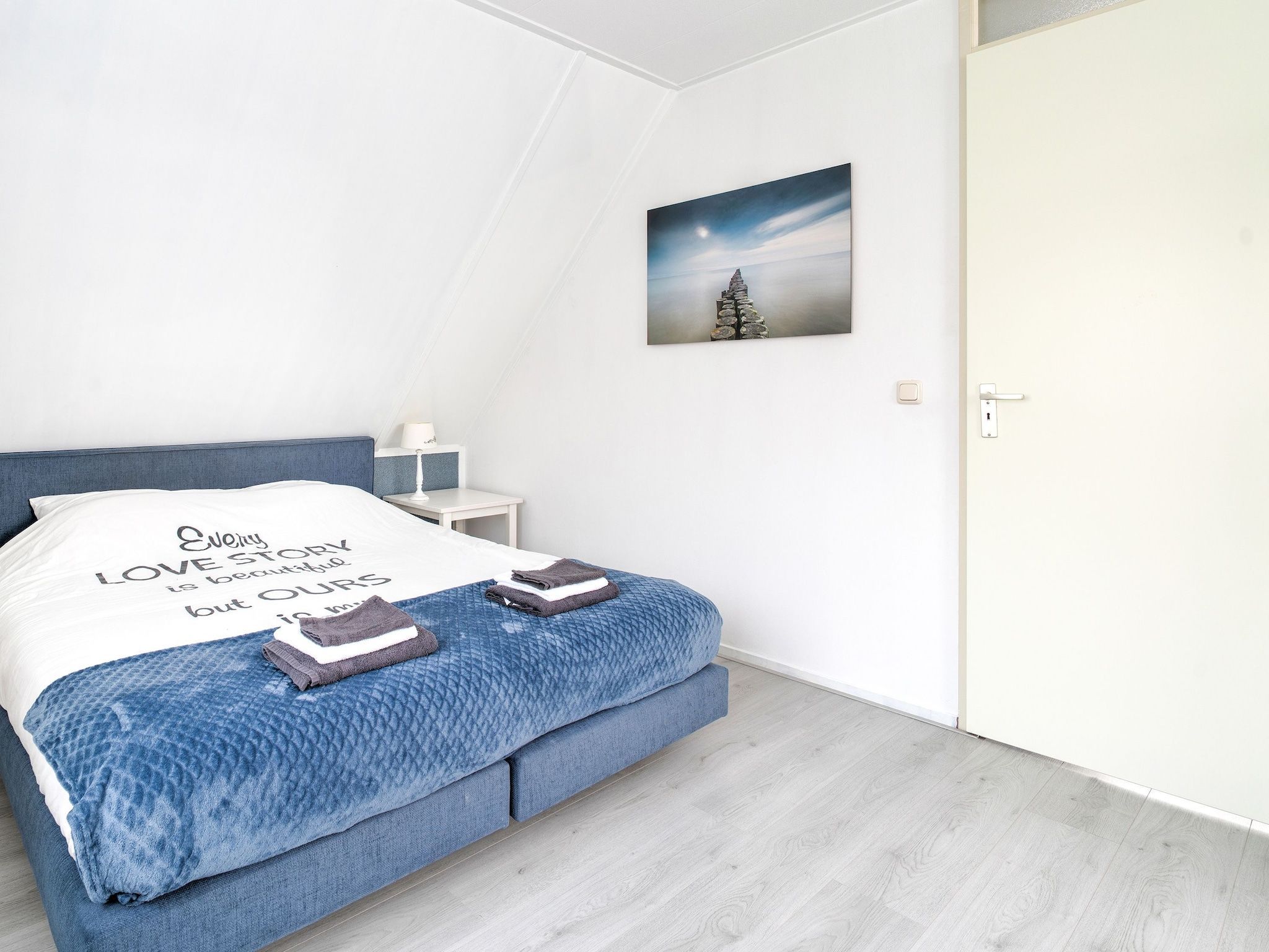 Een slaapkamer van Zonnig Hosterwold in Zeewolde