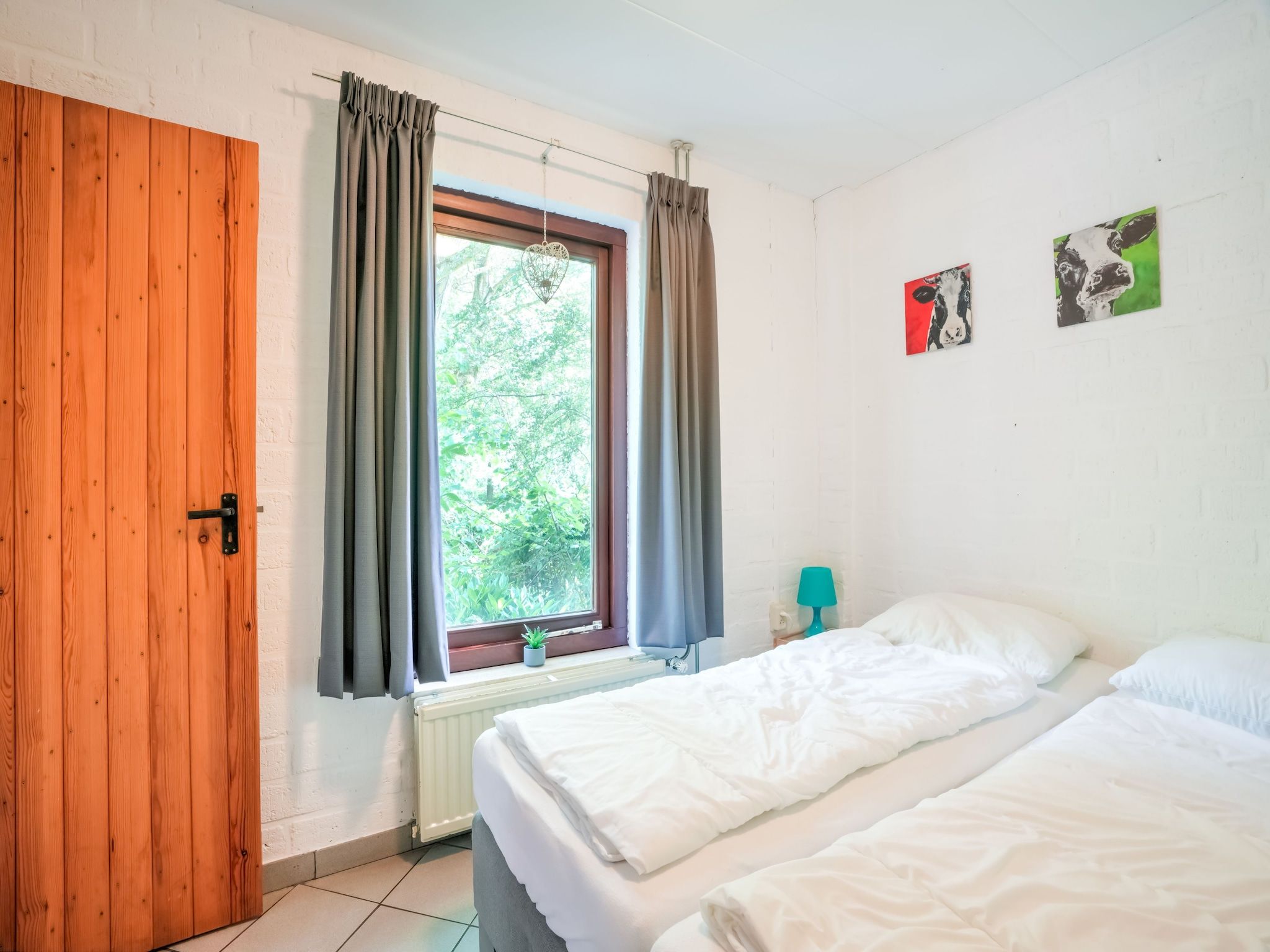 Een slaapkamer van Waterval 8P in Ulestraten