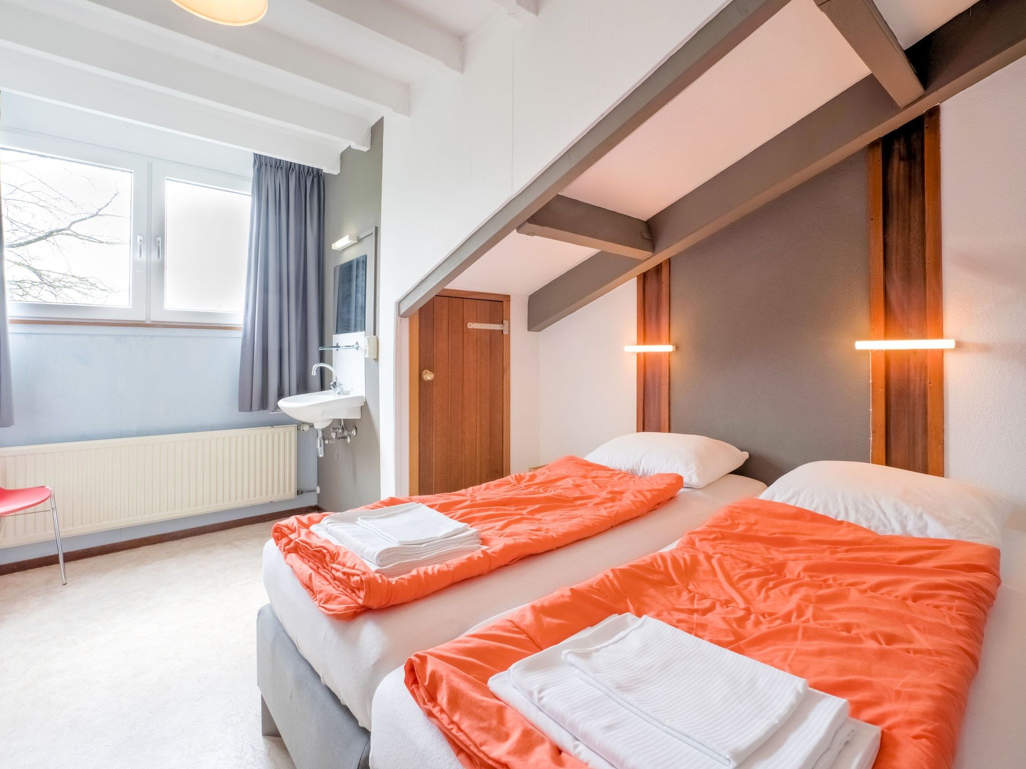 Een slaapkamer van Vliek 14P in Ulestraten