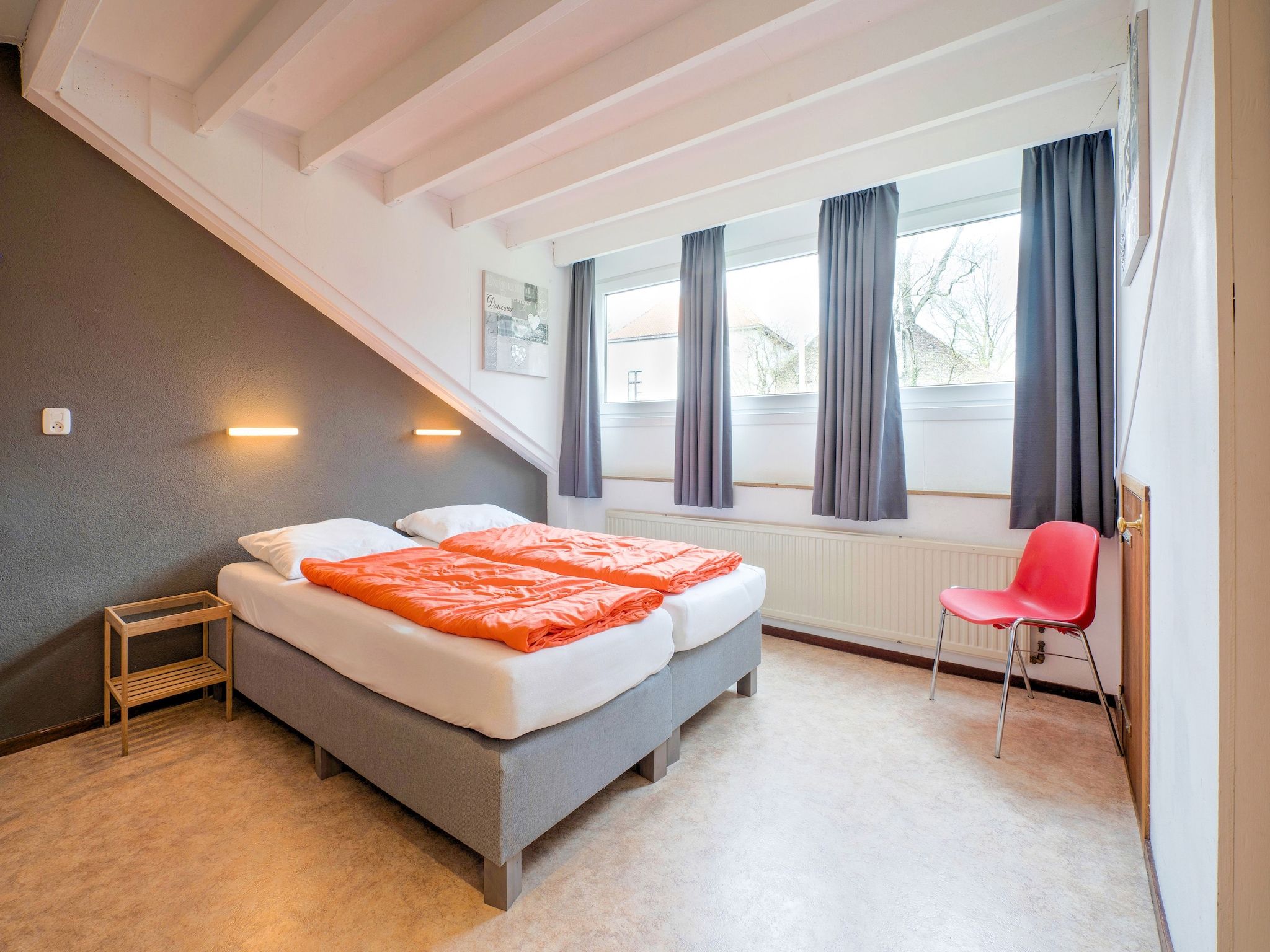 Een slaapkamer van Vliek 14P in Ulestraten