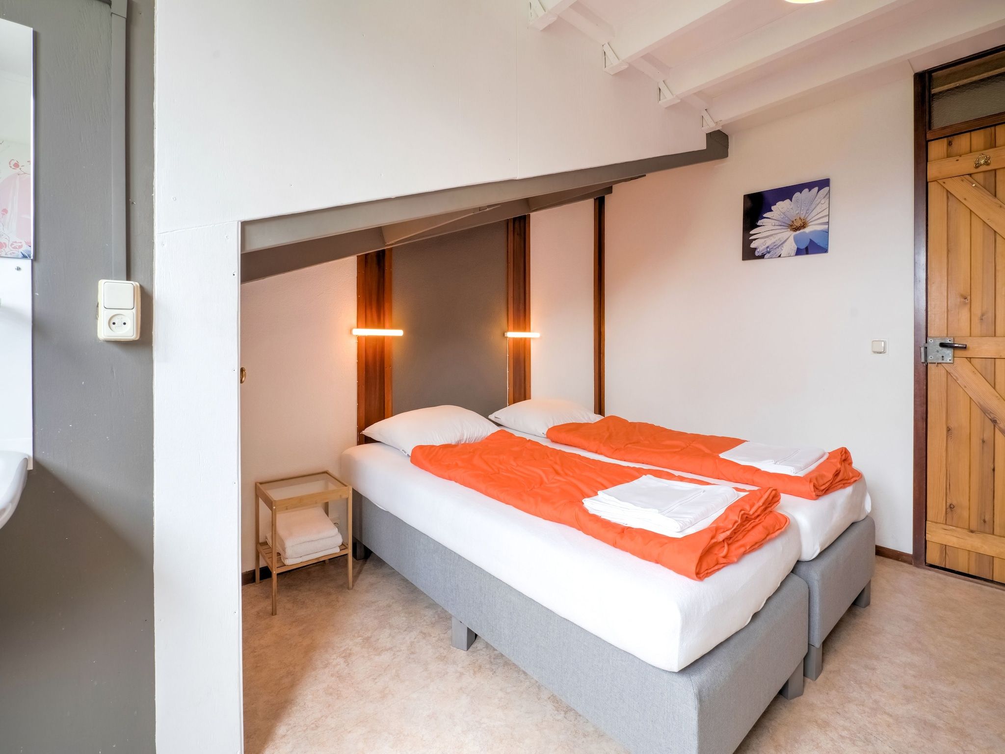 Een slaapkamer van Vliek 14P in Ulestraten