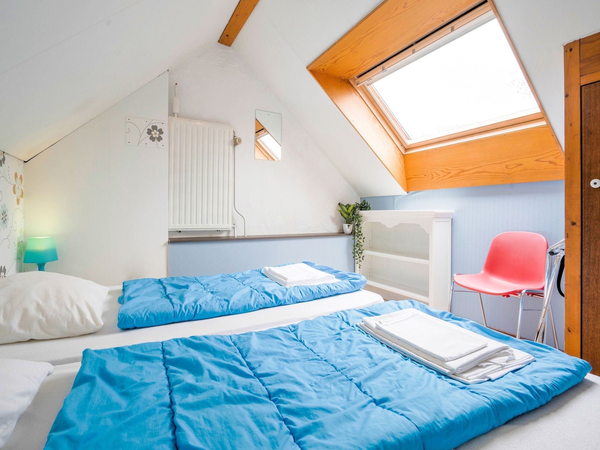 Een slaapkamer van De Wingerd 10P in Ulestraten